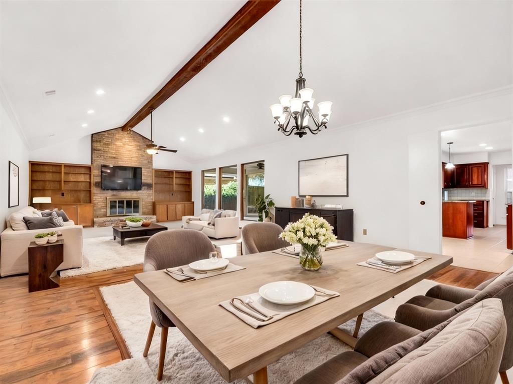 NEWLY PAINTED & NEW CARPET!!! MOVE IN READY!! Welcome to this beautifully updated 4-bedroom home featuring soaring cathedral-style ceilings and a striking wooden beam that adds warmth and architectural charm. The spacious floorplan offers a seamless flow, perfect for both everyday living and entertaining. Thoughtful built-in shelving and cabinetry provide stylish and functional storage throughout the home. One of the four bedrooms is a versatile bonus room complete with a built-in bar—ideal for use as a second living area, media room, or entertainment space. Updated windows flood the home with natural light, highlighting the fresh, neutral paint and brand-new carpeting throughout. With a perfect blend of character and modern updates, this move-in-ready home is a must-see! Generous-sized primary bedroom has separates vanities, granite counters, 2 walk-in closets and built-ins. Two bedrooms share a Jack & Jill bath. Large utility room with room for a refrigerator and spacious walk-in pantry. Private backyard with tons of space for kids or pets to play. The location can’t be beat with access to shopping, DART, dining, golf, parks. NO HOA!