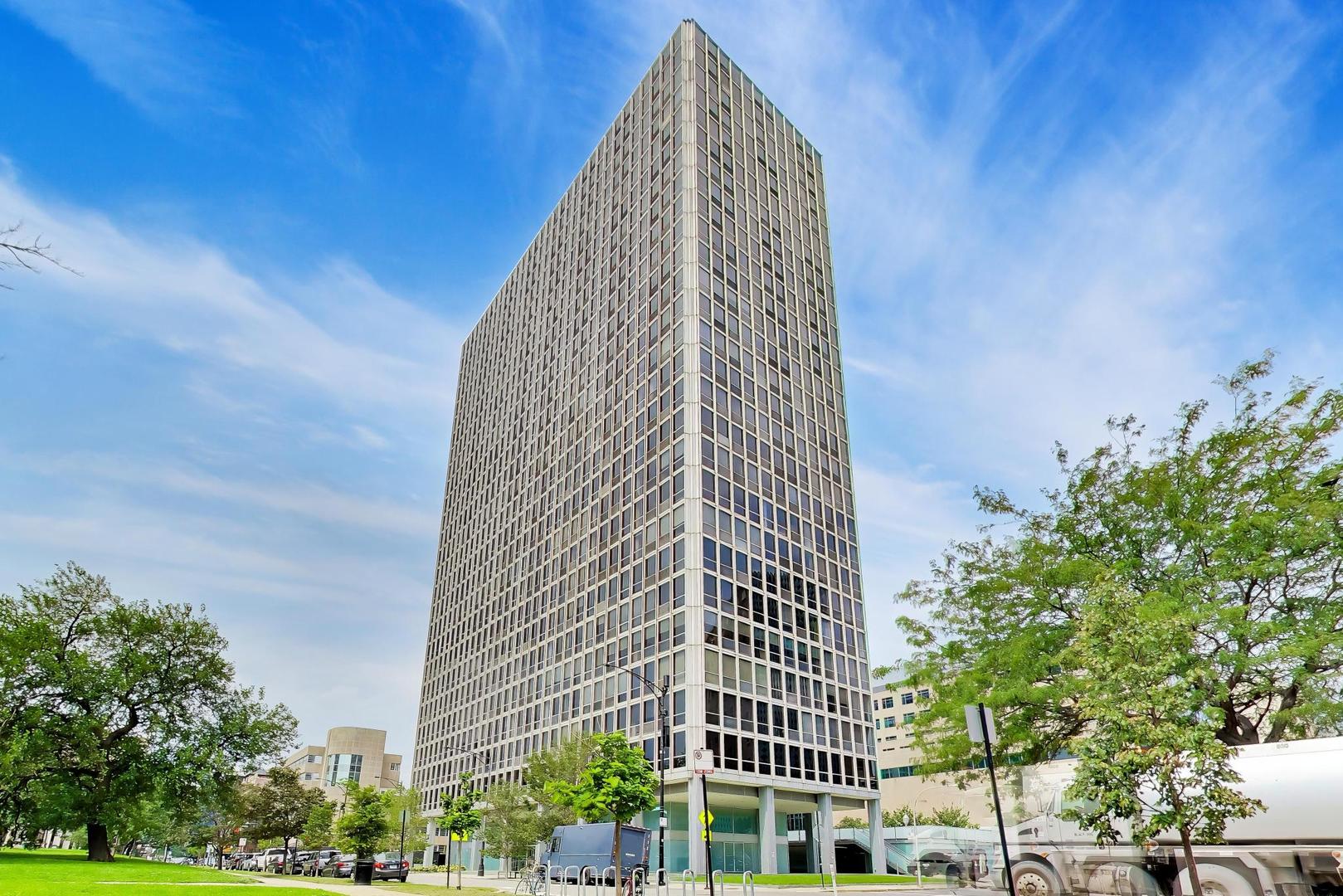 Rare opportunity to own a true 5-bedroom, 4-bath home with approximately 2,800 square feet in one of East Lakeview's most desirable lakefront locations adjacent to Lincoln Park. Created from combined residences 902-04, this exceptionally spacious condo offers the scale and flexibility of a single-family home with the convenience of high-rise living. The expansive floor plan features two separate living areas-a large living/dining room ideal for entertaining and an equally generous family room-providing a remarkable amount of everyday living space. The updated kitchen is outfitted with Sub-Zero, Thermador and Bosch appliances, abundant cabinetry and counter space. Five well-proportioned bedrooms include a spacious primary suite, while four full baths make the layout exceptionally functional for family, guests, home offices or live-in help. Laundry room, mud room 2 seprate entrances and exceptional amount of storage. While not marketed as a view unit, several windows offer glimpses of Lake Michigan, and the building's location directly along Lincoln Park puts the lakefront, park, trails and recreation just outside your door. Located in the highly sought-after Nettelhorst Elementary attendance area and moments from the best of Lakeview and Lincoln Park. An extraordinary amount of space in an irreplaceable park-and-lake location. This is an estate sale.