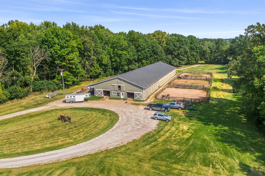 New Price! This well-maintained equestrian facility offers a perfect blend of indoor and outdoor amenities. Spanning three parcels totaling 59.97 acres, this property is ideally located in Ann Arbor (Scio Township). The centerpiece of the property is a horse barn with 20 stalls, a 60'x140' indoor arena, a tack room with a viewing area, and a wash rack. Outdoors, you'll find three paddocks, three large pastures, and three run-in sheds. Riders will also enjoy access to the Honey Run Equestrian Easement, which includes over 70 acres featuring a cross-country course, a dressage arena, a jumping arena, and scenic riding trails. Parcel info is as follows: Parcel 1 is 10.02 acres (Dexter schools), Parcel 2 is 9.9 acres (Ann Arbor schools),Parcel 3 is 40.0 acres (Ann Arbor schools). This is an incredible opportunity you won't want to miss!
 Current use is Agricultural,Farm,Recreational.