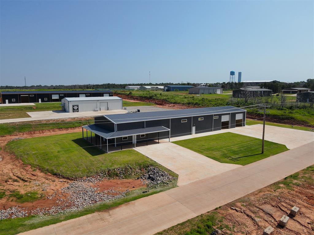 Welcome to Koloa Industrial Building #45, an excellent choice for your business needs! This 6,000 SqFt building for sale in Edmond, OK is located in the newly-built Koloa Industrial park. Conveniently situated off Sooner Road & Charter Oak Road just west of I-35, this building is equipped with a well & septic system, 3-phase 400 amp electrical, and four large garage doors so you can easily access and transport equipment or goods for storage or export. This building also features 17' tall ceilings and spray foam insulation, ensuring comfortable and energy-efficient use.

We are offering Owner Financing on this property for only a 10% downpayment. If you decide to finance with us there are NO credit checks, early payoff penalties, or hidden fees! We also welcome third-party financing and cash offers.

-1.11 Acre Corner Lot
-6,000 SF building
-17' Ceilings
-3-Phase 400 Amp Electric to Building
-4 Overhead Garage Doors two on each side
-Closed Cell Spray Foam Insulation
-Well & Pressure Tank
-Septic
-Natural Gas at the property
-Fiber at property