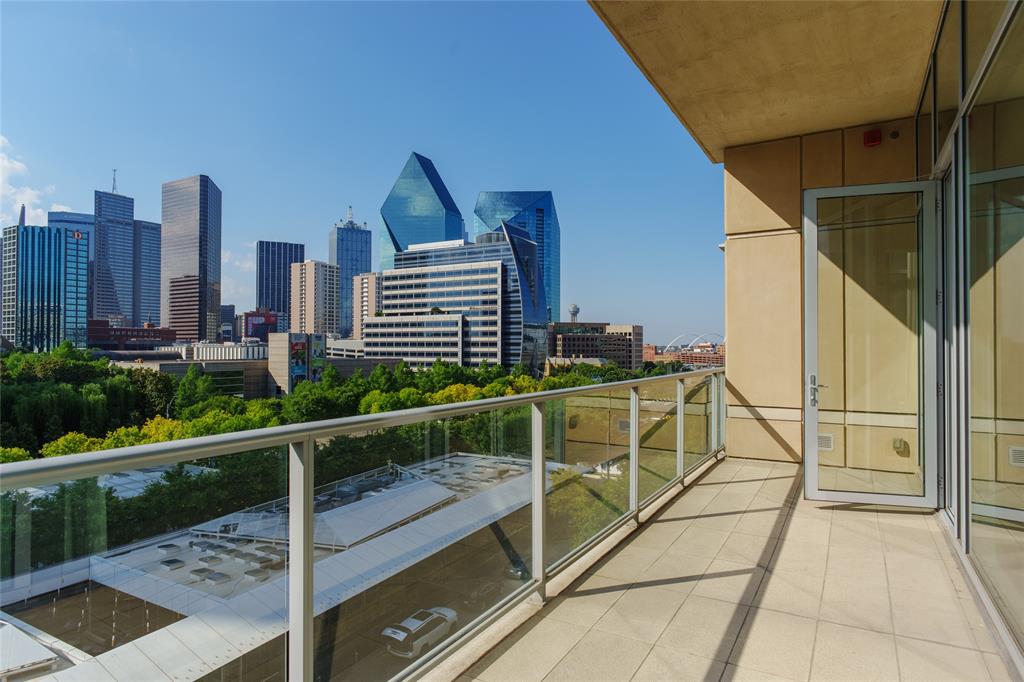 Modern Luxury with Iconic Views & Unmatched Privacy

Welcome to 2025 Woodall Rodgers, #51—a refined, modern residence designed for those who value privacy, sophistication, and a lock-and-leave lifestyle. Located directly across from Klyde Warren Park, you’ll enjoy daily access to live music, food trucks, yoga, and cultural events, all in the heart of the city’s most walkable district.

Step into a world of arts and culture with The Dallas Arts District just blocks away—featuring the DMA, Nasher Sculpture Center, Winspear Opera House, and more. World-class dining, upscale shopping, and entertainment in Uptown, Downtown, and Victory Park are minutes from your door, along with the American Airlines Center for concerts and sporting events.

This residence also sits at the epicenter of Dallas’s emerging financial corridor—“Y’All Street”—near the new Texas Stock Exchange, Goldman Sachs HQ, and Bank of America’s regional office.

Inside, the sleek, minimalist layout includes a chef-worthy Poggenpohl kitchen, two private balconies with stunning panoramic views of Downtown Dallas, and private access to a lockable bedroom suite—ideal for securing luxury timepieces, jewelry, or personal valuables. Recent updates include new designer fixtures, an updated ensuite in the secondary bedroom, and a brand-new HVAC system.

Perfect for C-suite executives, tech entrepreneurs, athletes, financiers, and frequent travelers, this home also offers easy access to all major airports—making weekend getaways and global travel effortless.

A rare opportunity for those who desire refined simplicity, urban energy, and complete discretion—in one of Dallas’s most prestigious and connected locations.