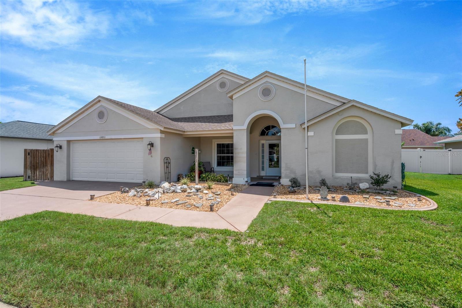 Welcome to 13853 Pimberton Drive, a spacious single-family home in Hudson offering a split floorplan for ample privacy. It has 3 bedrooms, 2 bathrooms, plus a den - 2,113 square feet of living space. Built in 1995 on an approximately 0.17-acre lot, this well-maintained residence provides plenty of room for comfortable everyday living, entertaining, and creating a home that reflects your style.Updates to the home include 5-year-old appliances, updated vinyl flooring through the communal parts of the home, a new pool pump, 6-year-old pool heater, roof and AC replaced in 2017. The AC unit gets regular preventative maintenance - condenser newly replaced this year. The home also boasts of a large pantry in the kitchen, enclosed privacy fencing in the back, separate laundry room leading out to the 2-car garage and solar panels to be paid off by the owner at closing providing you with a lower energy bill throughout the year.Conveniently located near Hudson's shopping, dining, recreation, and Gulf Coast attractions, the property combines generous interior space with access to the area's attractions like Busch Gardens and local beaches. Whether you're looking for a primary residence or your next Florida vacation home, 13853 Pimberton Drive is full of potential.