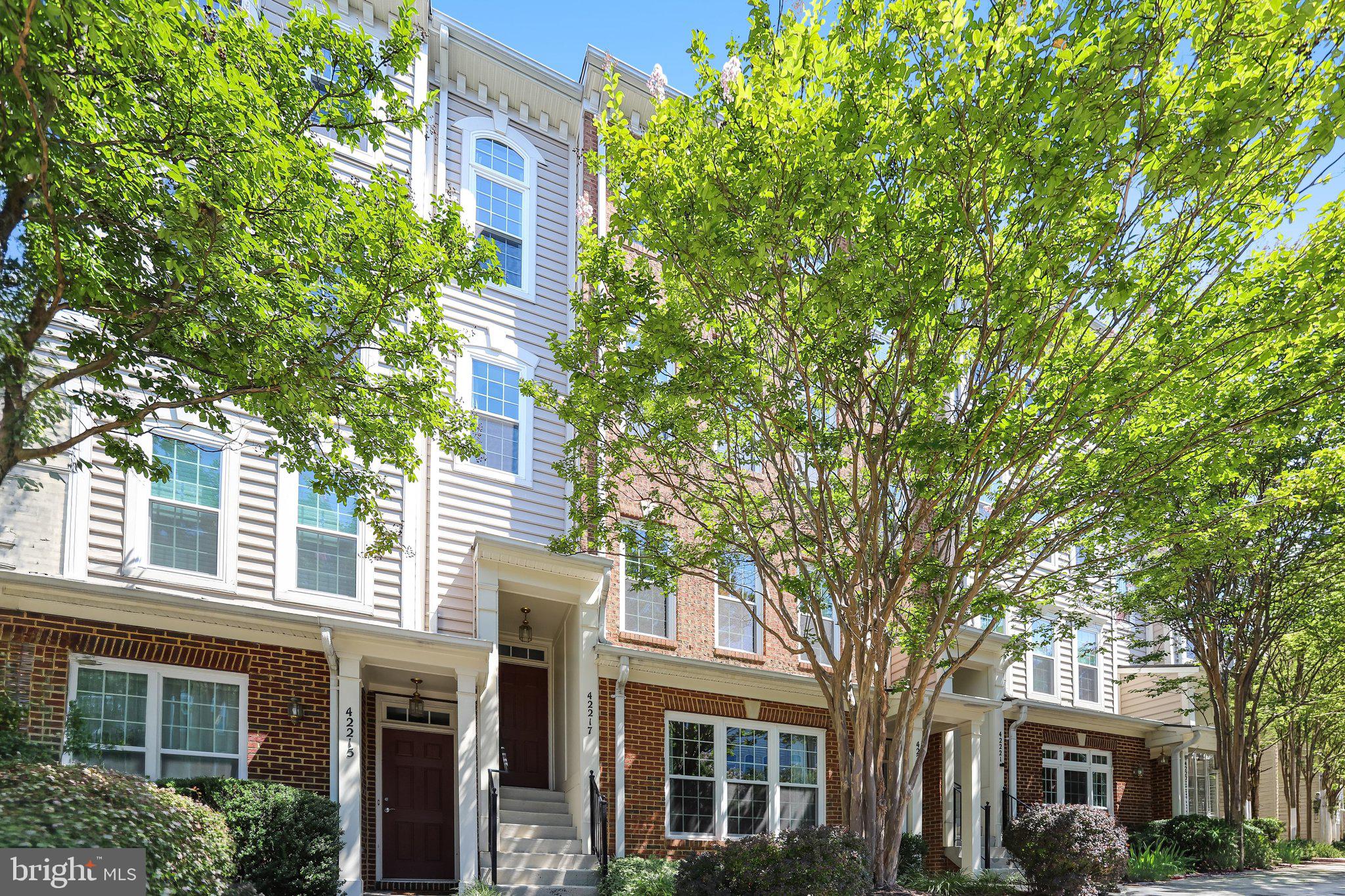 Welcome home to this inviting 3-bedroom, 2.5-bath condo in the heart of Stone Ridge. Hardwood floors flow throughout the main level into a spacious family room filled with natural light. The open kitchen offers a versatile eat-in area, a separate pantry, and generous cabinet and counter space, plus direct access to a large balcony for morning coffee or evening relaxing. Upstairs, the primary suite feels like a retreat with vaulted ceilings and a bath featuring a double vanity, soaking tub, and separate shower, while the upper-level laundry adds everyday ease. All-new windows (2025) and freshly painted bedrooms (2026) round out recent updates, and a one-car attached garage adds welcome convenience. The location is hard to beat, with Stone Ridge offering three community pools, a well-equipped fitness center, clubhouse, tennis courts, playgrounds, and walking trails, with the HOA covering water, trash, and exterior maintenance. Zoned for sought-after Loudoun County schools and just minutes from Route 50, Old Ox Road, and the Dulles Toll Road, with nearby shopping, dining, and the Dulles South Rec Center. Everyday convenience and a community you’ll love coming home to!