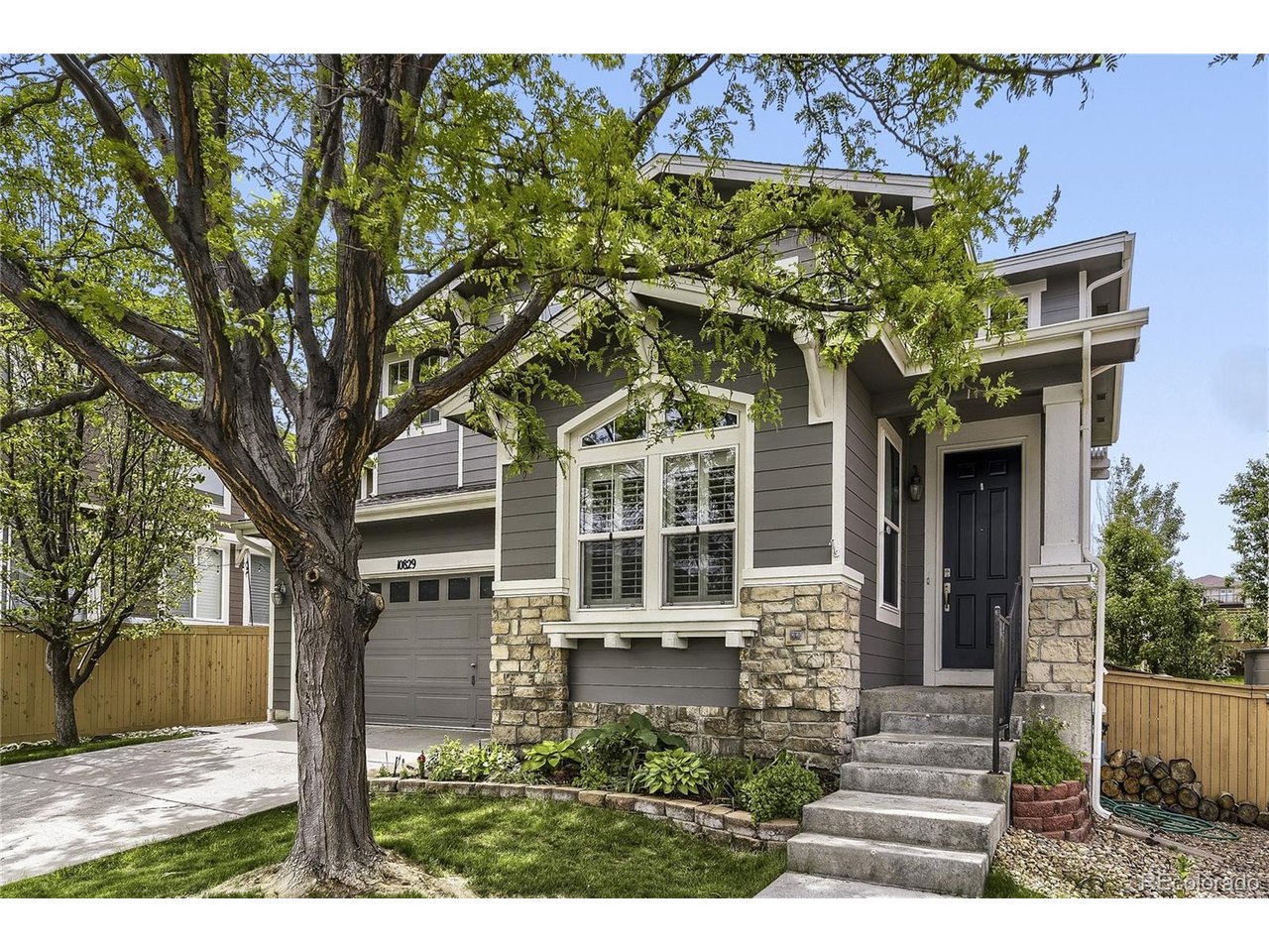 Welcome to this BEAUTIFULLY UPDATED 2-story Shea home with an EXCEPTIONAL, PRIVATE LOCATION in the coveted Firelight neighborhood. OVER 3,100 FINISHED SQUARE FEET with 4 bedrooms, 3 baths, and a private backyard with no neighbors directly behind you. This home features TIMELESS UPDATES THROUGHOUT, including an updated kitchen and baths, brand-new carpet, extended main-level wood floors, plantations shutters, a brand-new furnace, and a tankless water heater. Dramatic two-story entry with a beautiful spiral staircase. The main level offers a study, a formal dining room, a 3/4 bath, a spacious family room with a gas fireplace and built-ins, and a tastefully updated kitchen with newer appliances, quartz countertops, an undermount sink, a modern backsplash, a large island with seating, beverage refrigerator, and wood floors. Upstairs, the spacious primary suite includes dual walk-in closets, a barn door, a tray ceiling, and a fully updated bath with a new vanity, standalone tub, fixtures, framed mirrors, frameless shower doors, new tile, and radiant heated floors. We round out the upper level with 3 additional bedrooms and an updated full bath with quartz countertops, new fixtures, and tile floors.. The finished basement offers a large open flex space with great natural light, plus a wine room and generous storage. The backyard is ideal for entertaining with a huge stamped concrete patio, gas fire pit, an outdoor kitchen with a built-in barbecue and a wood-fired oven. Beautifully landscaped with plenty of perennials, trees, and gorgeous garden areas. Fantastic location- Walk to parks, trails, schools, shopping, restaurants, Southridge Rec Center, and the Backcountry Wilderness Area. Easy access to 470, I-25, light rail, DTC, Denver, Chatfield Reservoir, and the Mountains! Highlands Ranch amenities including activities, events, the Backcountry Wilderness Trail Systems, 4 Rec Centers with weight/cardio rooms, gyms, tennis courts, pools, classes, and much more.