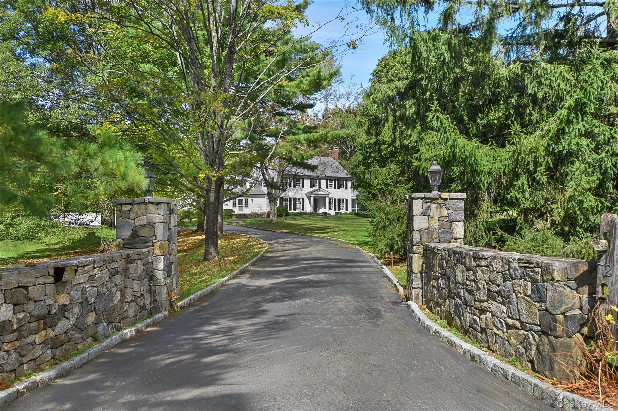 So classically Bedford. White clapboard colonial on nearly five gated acres of spectacular, private, totally level land with screened porch and beautiful heated pool and spa.  The house is full of charm and has three fireplaces, a great office as well as a beamed bonus/media room. There is plenty of storage in the full, unfinished basement. Long Meadow is a picturesque, quiet cul de sac with a perfect location just two minutes to the Village, five minutes to the train and is directly across from Bedford Golf & Tennis. The house was renovated in 2019 and is totally move in ready. Whole house generator.