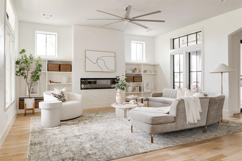 Motivated seller! This 4-bedroom, 4-bathroom custom home sits on a prominent corner lot in the heart of Wheeler District—one of Oklahoma City’s most vibrant and walkable communities. Thoughtfully designed with high-end finishes and upgrades throughout, this home offers a rare combination of luxury, comfort, and functionality. The open-concept kitchen, dining, and living areas flow seamlessly to a covered patio equipped with a fireplace and built-in heaters—perfect for entertaining or relaxing year-round. The first-floor primary suite is a spacious retreat featuring two large walk-in closets and a spa-like en-suite bath. Upstairs, three additional bedrooms offer ample space for family and guests. One bedroom opens to a private balcony, ideal for enjoying Oklahoma sunsets. The second floor also includes over 400 sq ft of unfinished bonus space—ready to be customized as a home office, gym, media room, or additional storage. A rare and highly desirable feature in Wheeler District, the home includes a dedicated workshop off the garage—perfect for hobbies or extra storage. A whole-home generator adds peace of mind, ensuring year-round comfort and reliability. With its unbeatable location, smart layout, and unique features, this home offers an incredible opportunity to live in one of OKC’s most sought-after neighborhoods. Don’t miss your chance to own a truly one-of-a-kind home in Wheeler District.