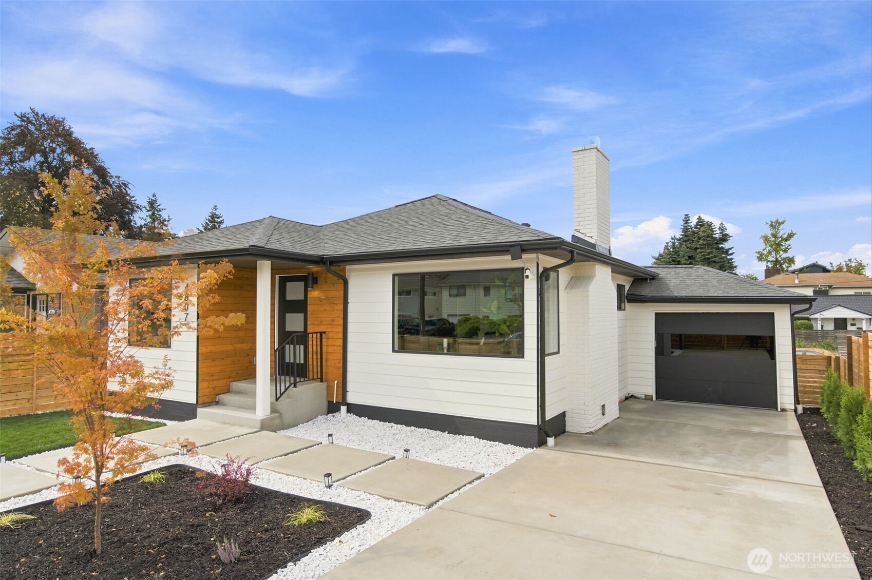 Welcome to this stunning complete rebuild in the heart of Beacon Hill. Down to the studs, every major outdated system has been redone and redesigned. Permitted and craftsmen built, the result is a designer-driven 4-bed, 1.75-bath home with 1,960 SF across two finished levels. Attention to detail shines as you move through the main floor with a bright living room, dining area and chef's kitchen boasting an oversized island, quartz counters, SS appliances, custom tile backsplash and solid wood soft-close cabinetry. The bright living room with cozy wood fireplace blends seamlessly with an elegant dining area featuring a picture window. Upstairs, a bedroom/office with a private deck is a quiet retreat, while a 2nd bedroom and custom-tiled bath with brass fixtures round out the level. Downstairs features a large primary and additional bedroom, full bath, laundry room and generous flex/rec room with wet bar, wine fridge and electric fireplace - perfect for entertaining, guests, or game day. Nearly every major system is new, incl. electrical, plumbing, heat-pump, windows, doors and insulation. LVP flooring, hand-selected finishes, fresh landscaping plus a fully rehabbed garage with EV charging complete the package. Pre-inspected with report, scope, feature sheet and builder’s note. Close to Maple Wood Playfield, Jefferson Park, dining, Metro and light rail. Easy access to Beacon Hill, Columbia City, Georgetown, SODO, downtown, I-5 and I-90. Tour soon, value like this won't last!