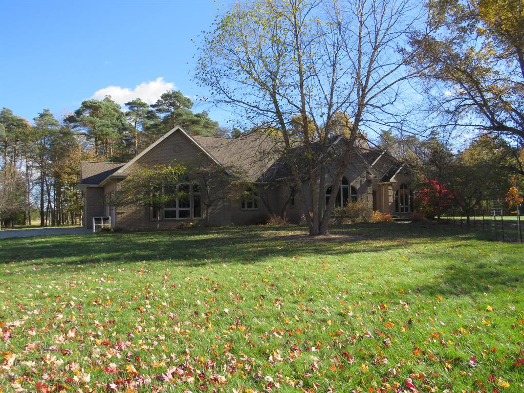 Immaculate home and pond on 63 ac in Saginaw County! No expense was spared in the build of this 5 bed 4 bath brick home. The upstairs features two separate living areas, formal dining, fireplace and half kitchen in the hall to the master bedroom.  Additionally, there is a West wing with a full kitchen, bath, living room and bedroom.  The full basement is unbelievable, with a massive gathering and living area, full kitchen, custom bar space, bedroom with full bath and a 10 person sauna!  Outside you will find the 30x60 garage for toy and equipment storage.  The land is a combination of open ground with fruit trees and spruce trees randomly scattered and thick woods that is loaded with deer and turkeys.  This is truly one you need to see in person to appreciate!  Contact the listing agent directly for more information.