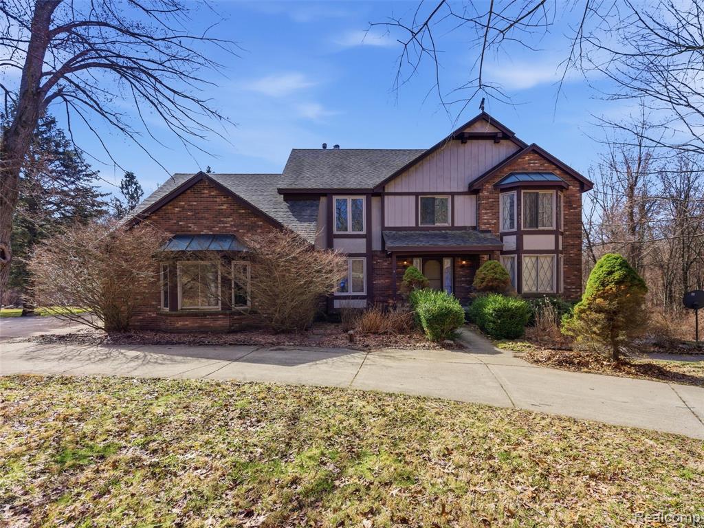 Featuring a spacious 4-bedroom, 4.5 bath home set on more than 10 wooded acres, complete with a walkout basement. The inviting layout offers a living room that flows seamlessly into the dining room and continues into a comfortable family room featuring a cozy fireplace—perfect for relaxing evenings.The large kitchen showcases oak cabinetry, granite countertops, and eat-in area, along with two convenient pantry spaces. A first-floor laundry room provides added convenience. The spacious Primary bedroom features hardwood floors that remain in good condition and an inviting inset fireplace with space to create a cozy hearth area. The en suite bath offers both comfort and functionality, featuring a separate shower and jetted tub for soaking, along with a walk-in closet conveniently located within the bathroom. Enjoy the sizable in-ground indoor pool, perfect for water enthusiasts, or explore the option of transforming the space to suit your lifestyle—such as a fitness area, game room, or other creative use. Step outside to a large backyard deck overlooking the peaceful, wooded setting - an ideal space for entertaining or enjoying nature. The deck is in need of repair, and additionally, while the home overall offers a wonderful opportunity for buyers to add their personal touches, it does require some TLC.The finished basement includes a bonus bedroom with an egress window, providing additional living or guest space. Recent updates include two newer furnaces with humidifiers and a newer hot water heater.**Buyer to verify all information and measurments**