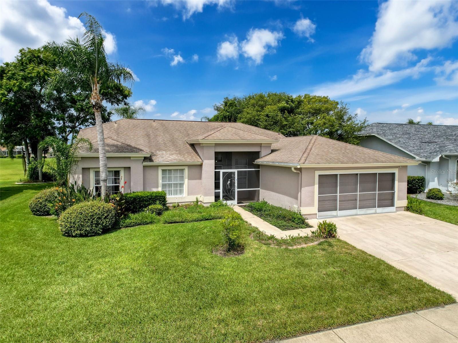 Welcome to The Estates, an established community of custom-built homes. Step through the screened entry into an open floor plan filled with natural light, vaulted ceilings, creating a seamless flow between living spaces. The large living room opens to the screened lanai and pool through triple sliding glass doors—ideal for entertaining or relaxing providing that indoor-outdoor leisurely Florida lifestyle. The eat- in kitchen sports granite counter-tops , stainless-steel appliances, a farm sink plus a breakfast bar.  The separate dining room, shown as a music room in the photos can provide a formal setting for family meals or celebrations. The primary ensuite is light and bright, crystal clear pool and spa access through a sliding glass door, a walk-in closet, and a step- in shower with a private water closet. This home was designed with a split floor plan, giving two additional guest bedrooms to share a lovely bath with a tub and shower.  Separate laundry room includes an upgraded and washer, dryer, and sink provided entry to the two-car garage, all garage shelving can convey, let's not forget about the exterior screened garage door.  The low HOA includes upgraded cable, high-speed internet, lawn care, pest control, trash pickup, and full access to the clubhouse, with a fitness center, outdoor pool, library, billiards, ping pong, tennis, pickleball, and basketball . Don't forget to bring your golf clubs to play on the many public courses in the area. You will be 2 miles off the Gulf of America so pack the kayaks and fishing rods.