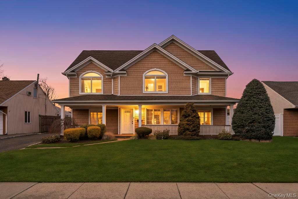 Colonial-style home featuring 5 bedrooms and 2 bathrooms, located in the Island Trees School District.The home has been updated with a modern kitchen and granite countertops, complemented by stainless steel appliances. Bathrooms have also been updated. Wood floors run throughout the home.Roof is approximately 20 years old, and the siding is also approximately 20 years old.The home offers a spacious family room with vaulted ceilings and oversized windows that provide abundant natural light. Additional features include Anderson windows throughout.Exterior highlights include a 2-car garage and a separate shed for additional storage.Utilities include electric heating with 200-amp service, oil heat, and a gas line available at the street.The second floor and garage feature an open floor plan, offering flexible living and storage space.