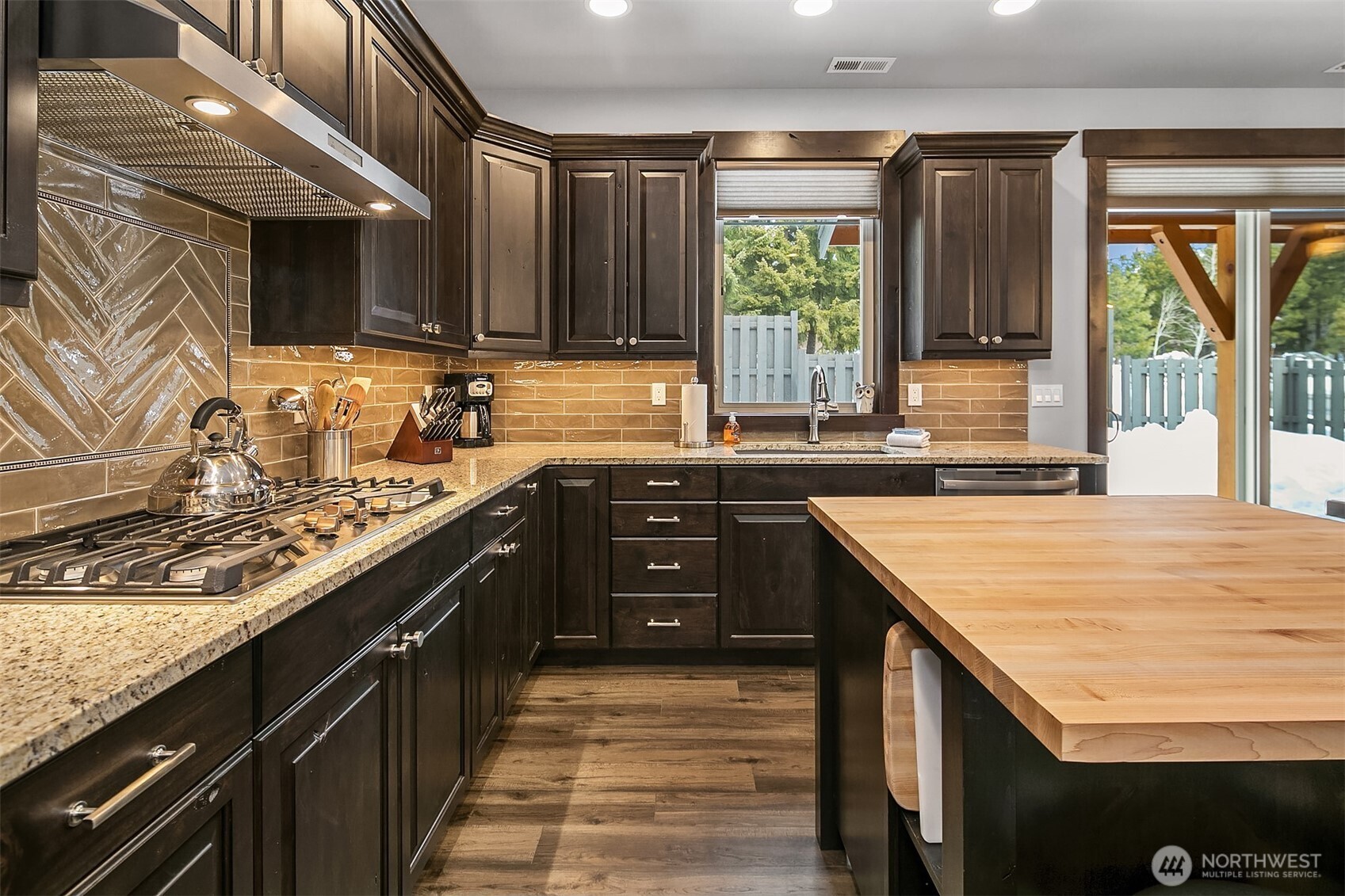 Large kitchen fully equipped. Gas cooktop, all appliances stay