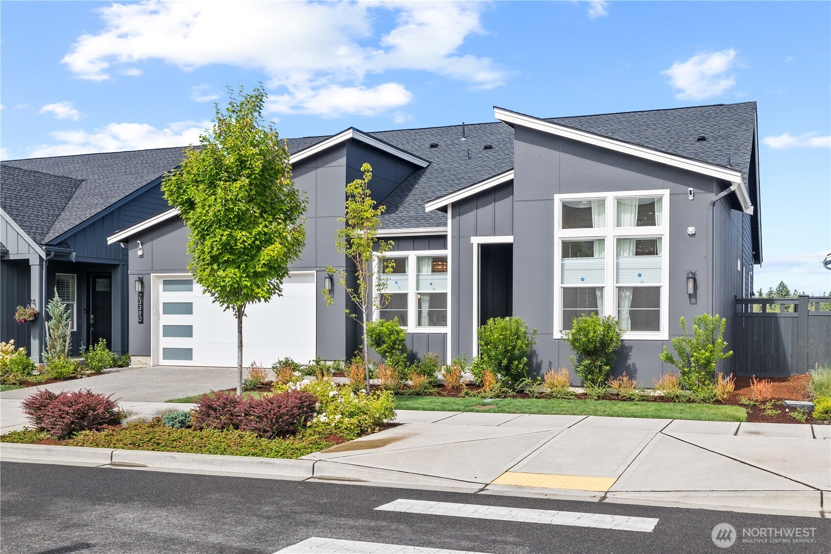 **BUYER INCENTIVE AVAILABLE. THIS HOME QUALIFIES FOR UP TO 1% LENDER-PAID CREDIT THROUGH GUILD MORTGAGE, WHICH MAY BE USED TO LOWER THE INTEREST RATE, REDUCE CLOSING COSTS, OR DECREASE MONTHLY PAYMENTS. AVAILABLE TO QUALIFIED BUYERS WITH AS LITTLE AS 3% DOWN.** Indulge in unmatched luxury at the 55+ Regency at Ten Trails, showcasing the highly coveted Toll Brothers Vela floor plan. With soaring 12-ft ceilings, designer light fixtures, and an open-concept layout, this home exudes sophistication. The gourmet kitchen features a spacious island, walk-in pantry, and premium finishes, while multi-panel stacking glass doors in the great room lead to a covered outdoor living area and fully fenced yard—perfect for seamless indoor-outdoor living. Dual primary suites with spa-inspired baths and walk-in closets offer unparalleled comfort and flexibility. An oversized flex room, dedicated office, and centrally located laundry add to the home’s thoughtful design. HOA perks include 1-gig internet, front lawn care, and more. Enjoy resort-style amenities such as a clubhouse, fitness center, pool, and walking trails. This is luxury living redefined!