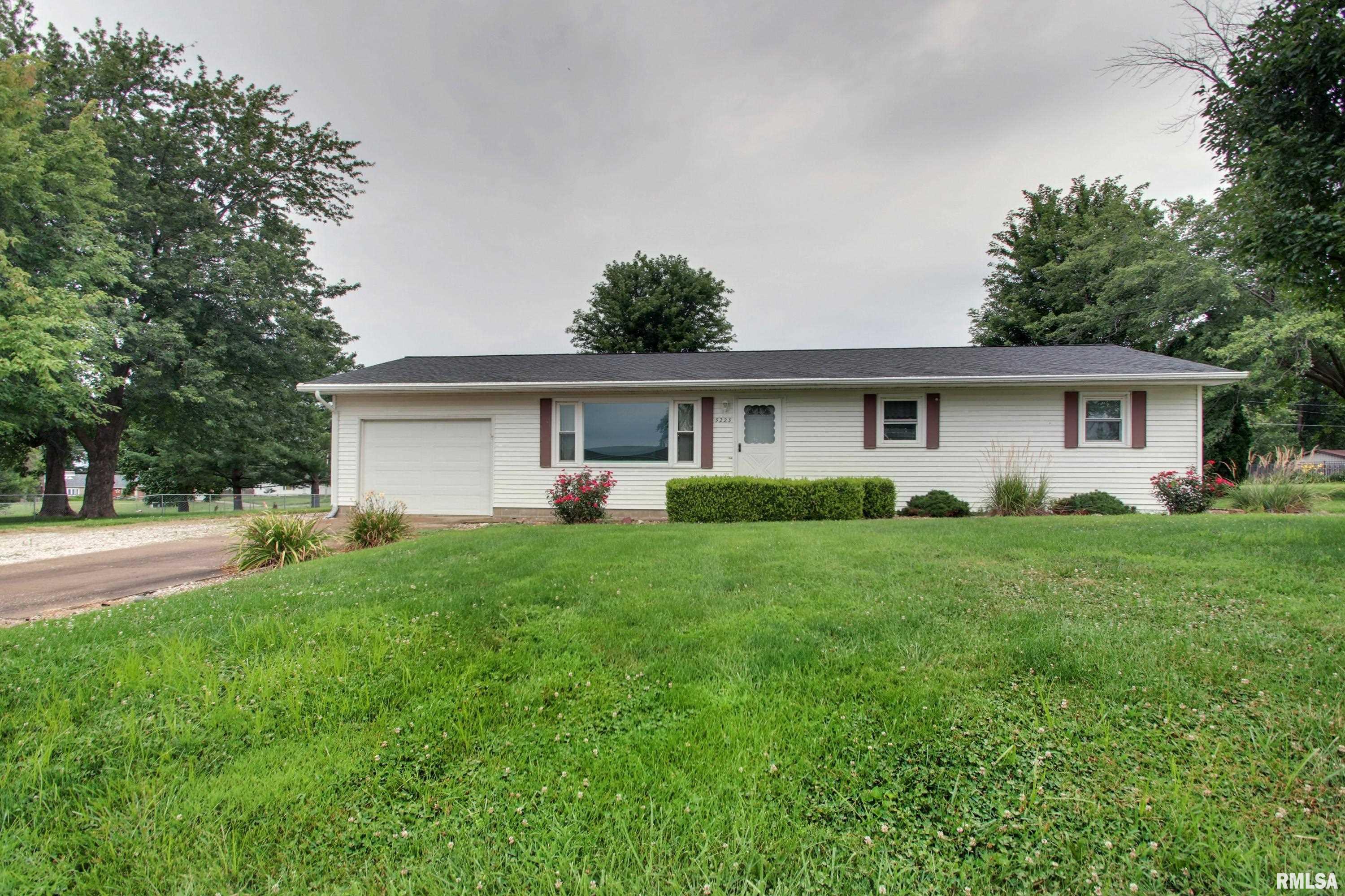 Edge of town!  3-bedroom, 1½-bath ranch home situated on approximately a half-acre lot and has convenient one-level living. Spacious lot offers room to enjoy the outdoors. A 10' x 12' addition to the rear of the garage, along with a yard shed, provides plenty of space for storage, hobbies or a workshop. Extended driveway offers more parking availability.   Great opportunity to make this home your own! Inspections welcome, selling as-is.