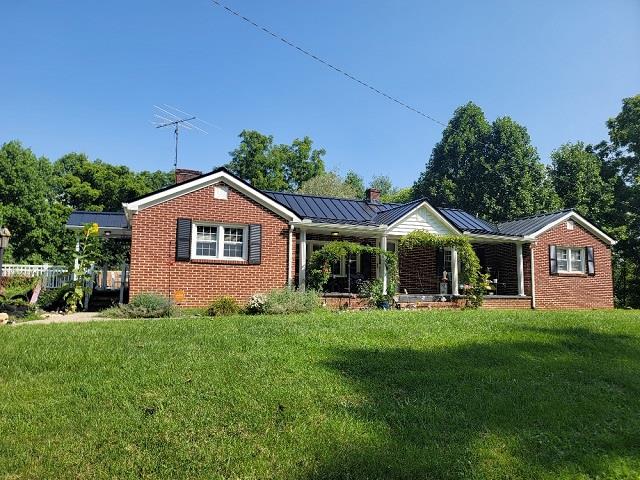 Don't miss this beautifully updated 3-bedroom, 2-bath brick ranch conveniently located just minutes from the New River, New River Trail, and the Byllesby public boat landing—nice for outdoor enthusiasts. This charming home features a standing seam metal roof, replacement windows, and a modernized kitchen. Inside, you'll find a cozy living room and a separate den complete with a wood stove for added comfort. Step outside onto the spacious Trex deck, ideal for entertaining or relaxing in your private outdoor space. A massive 50x30 detached garage offers ample room for vehicles, workshop space, or extra storage. This home has it all—location, upgrades, and space to enjoy! Call Today!