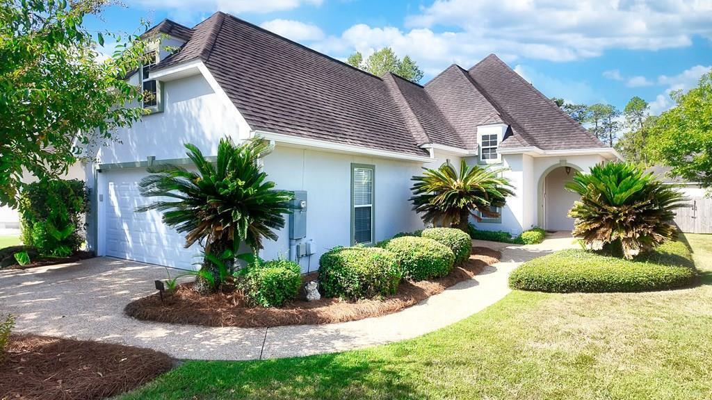 Welcome to this beautiful 3-bedroom, 2-bath home in one of Thomasville's most loved family neighborhoods — a place where comfort, charm, and community come together. You'll love the open floor plan with hardwood and tile floors, a bright kitchen with granite countertops, new appliances, and bar seating that makes it easy to cook, chat, and entertain. A cozy sunroom adds the perfect touch for plant lovers or anyone who enjoys quiet mornings with coffee and sunlight. The spacious primary suite feels like a retreat with its walk-in closet, double vanities, and relaxing tiled shower with a separate tub. Step outside to a manicured front yard, a private fenced backyard with a grilling deck and patio, and a nearby community green space that's great for kids or pets. Just a quick golf cart ride to downtown Thomasville's shops and restaurants, this move-in ready home offers the perfect blend of modern style and small-town heart.