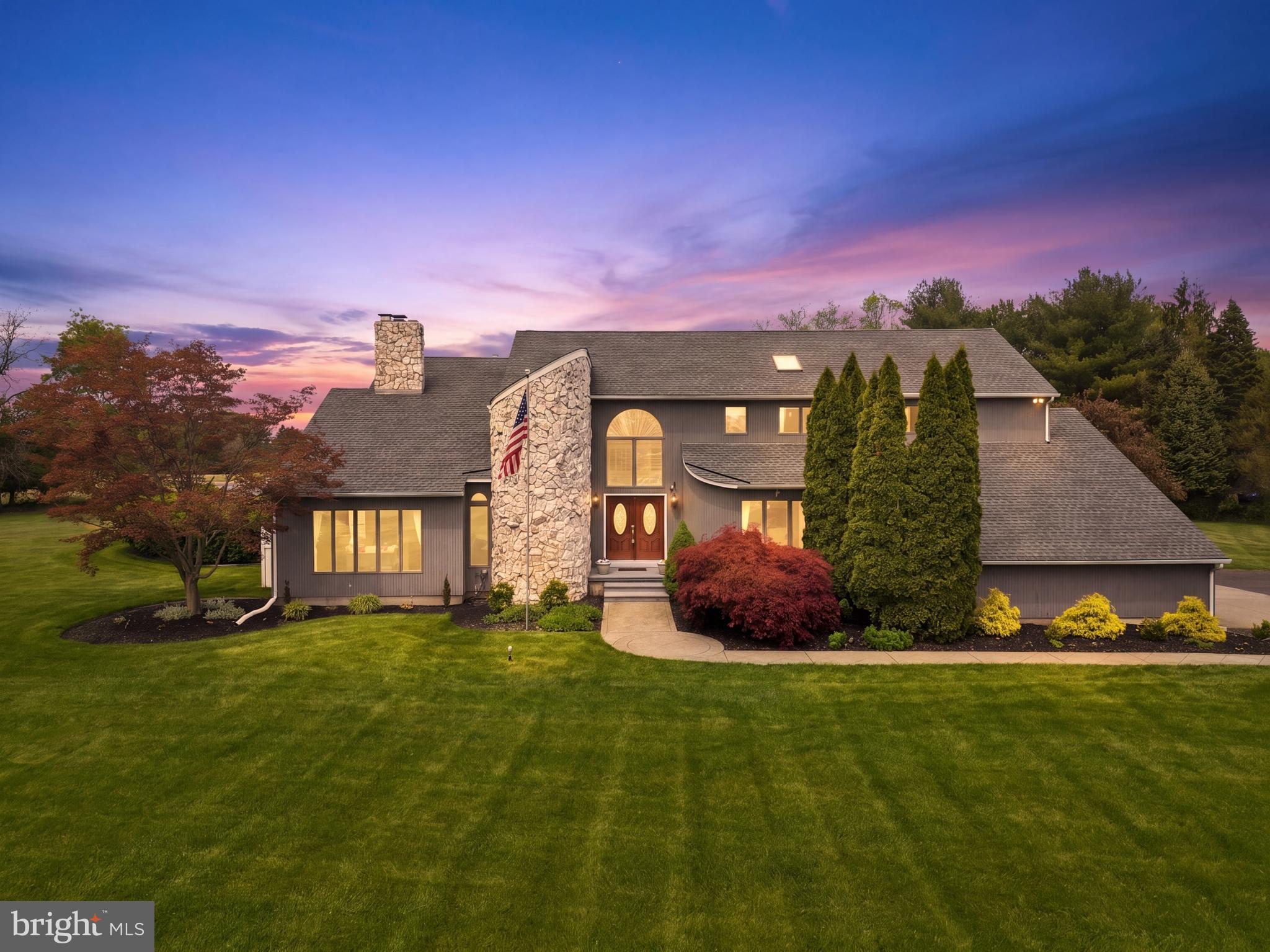 Welcome to this exceptional custom-built home offering over 4,500 sq ft of beautifully updated living space. Tucked away on a private cul-de-sac and backing to hundreds of acres of preserved land, this 4-bedroom plus study, 3.5-bath residence delivers breathtaking sunset views, unmatched privacy, and the perfect blend of luxury and convenience. Step inside to a thoughtfully designed interior featuring fresh paint, new carpeting, and recessed lighting throughout. The elegant dining room showcases maple hardwood floors and classic chair rail detailing, while the spacious living and family rooms provide ideal spaces for both everyday living and entertaining. At the heart of the home is the expansive eat-in kitchen, complete with granite countertops, abundant Schrock cabinetry, double wall ovens, and a cooktop, all seamlessly opening to the family room for a true open-concept layout. Two propane fireplaces with white Vermont marble and granite accents add warmth and character. Upstairs, the primary suite serves as a private retreat with a vaulted ceiling, access to a private deck, and a luxurious ensuite bath featuring custom tile, a frameless glass walk-in shower with dual shower heads and handhelds, built-in bench seating, and niches. The fully finished basement expands your living space with a dedicated entertainment area equipped with surround sound, along with flexible rooms ideal for a home office, gym, or playroom. Designed with efficiency in mind, the home includes 56 owned solar panels and a geothermal heating and cooling system, offering eco-friendly living and reduced utility costs. Set on 2.66 acres of meticulously maintained grounds with full irrigation, the outdoor space is truly resort-like. Enjoy a custom 30,000-gallon saltwater pool with waterfall and sheer descents, an attached spa, LED lighting, expansive stamped concrete patio, gazebo, low-voltage landscape lighting, two large storage sheds, and a full-yard underground pet containment system. Ideally located in a peaceful setting surrounded by preserved farmland, yet just minutes from Routes 70, 206, and 295, with convenient access to shopping, dining, wineries, breweries, and outdoor recreation. A rare opportunity to own a one-of-a-kind property that seamlessly blends luxury, privacy, and sustainability.