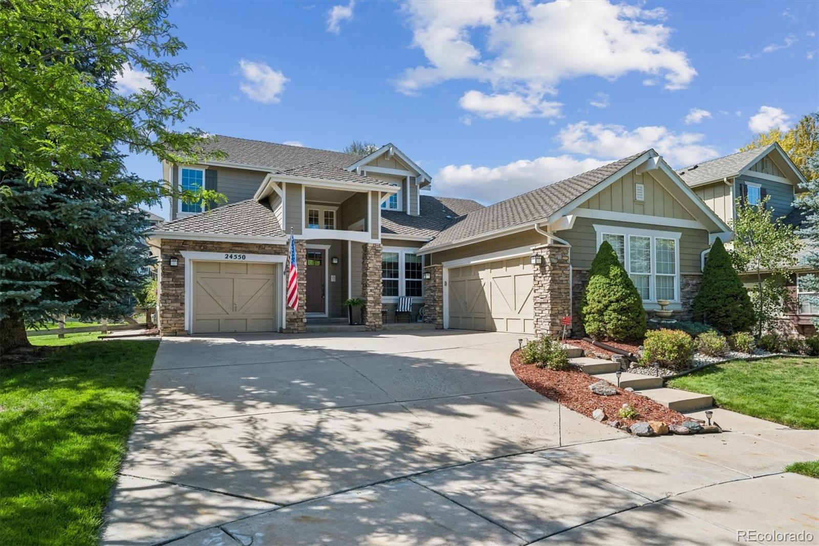 Curb appeal at its finest in highly sought-after Tallyns Reach! Located in the Cherry Creek school district, this beautifully maintained 5-bedroom, 5-bathroom home is ideally situated on a pristine cul-de-sac and offers an exceptional blend of style, comfort, and functionality. From the moment you arrive, you'll appreciate the beautifully manicured landscaping, impressive curb appeal, three-car garage, and extra-long driveway providing plenty of additional parking. Step inside to an open and inviting floor plan featuring soaring ceilings, designer paint, and beautiful hardwood floors. The main level offers a unique layout including a large family room with a stunning stone fireplace, plus an addtl open area flex room with endless possibilities. The kitchen shines with 42-inch cabinetry, newer granite counters, backsplash, and gas cooktop, butler's pantry, desk area, and a generous eating space. Main-floor laundry has option for a gas dryer and brand new tile flooring with cabinet storage. The spacious main floor primary suite features brand-new carpet and LVP flooring plus a HUGE walk-in closet. Major systems are already taken care of with a new furnace, A/C, and hot water heater in 2026, along with new windows in many areas.The finished basement is made for entertaining, featuring a wet bar with full-size refrigerator, expansive recreation space for pool or ping pong, a cozy TV area, plus a private bedroom and full bathroom. Outside, enjoy a wonderful patio, lush yard, gardens, and charming flower pots. Front/back Sprinklers and drip system.   Amenities include parks, swimming pool, playground, tennis courts, and pickleball courts.  This exceptional home offers an incredible combination of location, space, updates, and amenities at a great price. Move-in ready and just waiting for its new owner—don't miss the opportunity to make this impressive property your own!