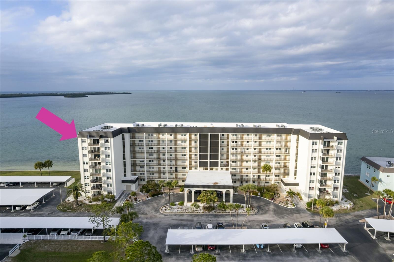 PARADISE FOUND! This condo is located on the top floor of the Royal Stewart Arms HIAG building. It is a corner end unit with spectacular panoramic water views of Honeymoon and Caledesi Islands as far as Clearwater and barrier islands. View sunrises and sunsets, shimmering waters, beaches, boating activities all from your private open balcony. Bedrooms, living room and kitchen have various un-obstructed views as well. This 1181 s.f. adorable  2 bedroom, two bath unit comes furnished for quick, easy move in. Final renovations have been completed and the building has a new fresh look to it, along with the totally improved community clubhouse and recreational facilities, including exercise room, clubhouse, huge swimming pool, tennis courts, pickle board courts, shuffle board and fishing dock. All assessments have been paid in full and Milestone inspections and SIRS have been successfully completed. Just outside of the complex is the entrance to Honeymoon Island State Park with ferry service to Caledesi Island. Honeymoon Island Park has beautiful sand beaches, a nature center, concession facilities, and nature parks and trails. The Dunedin Causeway has beaches, walking and bicycling access along with fishing, kayaking, paddleboarding and equipment rentals. There is also a Marina, hotels and restaurants to enjoy. Within a short drive is the St. Andrews Public Golf Course, Dunedin Community Center, Dunedin Fine Arts, Pinellas Bike Trail and Delightful Downtown Dunedin which hosts fresh markets, a marina, a pier, parades, musical and art festivities along with iconic restaurants and shops.