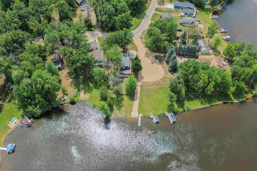 Welcome to your private lakeside retreat! Nestled in the desirable Lake of the Hills Subdivision in Weidman, MI, this beautifully renovated ranch-style home offers serene waterfront living on a no-wake, private lake. With 73 feet of direct water frontage, you'll enjoy peaceful mornings and stunning lake views year-round from your large, elevated deck that offers unobstructed views. This 3 bedroom, 1.5 bath home has been thoughtfully updated from top to bottom. A brand-new full walk-out basement was added during renovations, doubles your living space and opens up endless possibilities for recreation, storage, or additional living areas. Every major system has been replaced for peace of mind, including a new furnace, central air conditioning, water heater, septic system, and well system. The home also features brand new electrical and HVAC throughout. Whether you're looking for a year-round home or a seasonal escape, this move-in ready property offers the perfect combination of modern comfort and lakefront charm. Don't miss your chance to live the lake life in a completely turnkey home! Available fish-Northern Pike, large mouth bass, channel catfish, common carp, bluegills, yellow perch, rock bass, black crappie, sunfish, and bullhead.