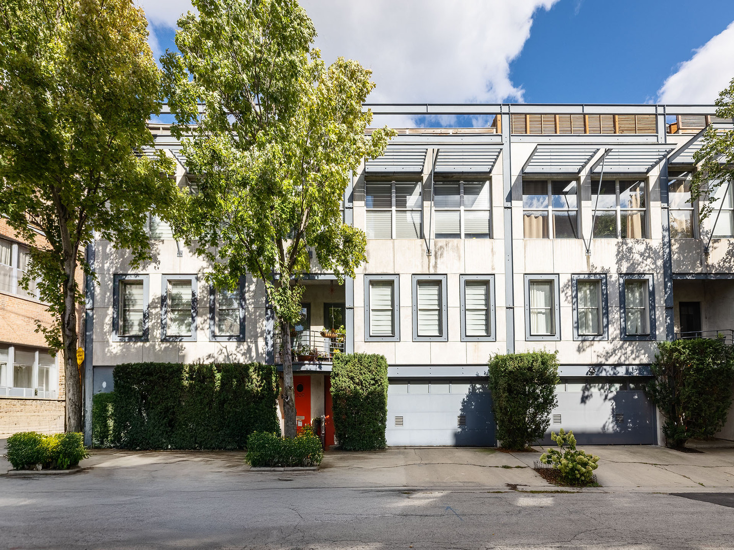 Pull into your 2-car attached garage and be greeted by this spacious 3-bedroom, 3.5-bath, no HOA, townhome. The residence sits on lovely tree-lined Ada Street and offers stylish city living in the heart of West Town.  The sleek kitchen features stainless steel appliances, a pantry, and is open to a spacious dining and entertaining area, with a fireplace, perfect for hosting friends or enjoying quiet evenings at home. With east-west exposure, you'll enjoy plenty of natural light in this home, along with partial views of the city skyline from the kitchen and roof deck.  The primary bedroom offers a spacious area to accommodate a king-size bed and features a beautiful en-suite bathroom with a tub and separate shower. A perfect respite after a long day. Also on this level is your secondary bedroom, which features a hall bath.  The third bedroom is located on the lower level with a very high ceiling, a full bath, and a full-size washer-dryer. Great for a guest room, office, or fitness area!  Enjoy some city views while enjoying your large private roof deck;  a wonderful spot for relaxing or dining al fresco.    With easy access to the expressway and amenities in West Town, River West, West Loop, and Fulton Market, you'll be minutes from some of Chicago's best restaurants, shops, and nightlife. A home that blends modern comfort with unbeatable convenience.