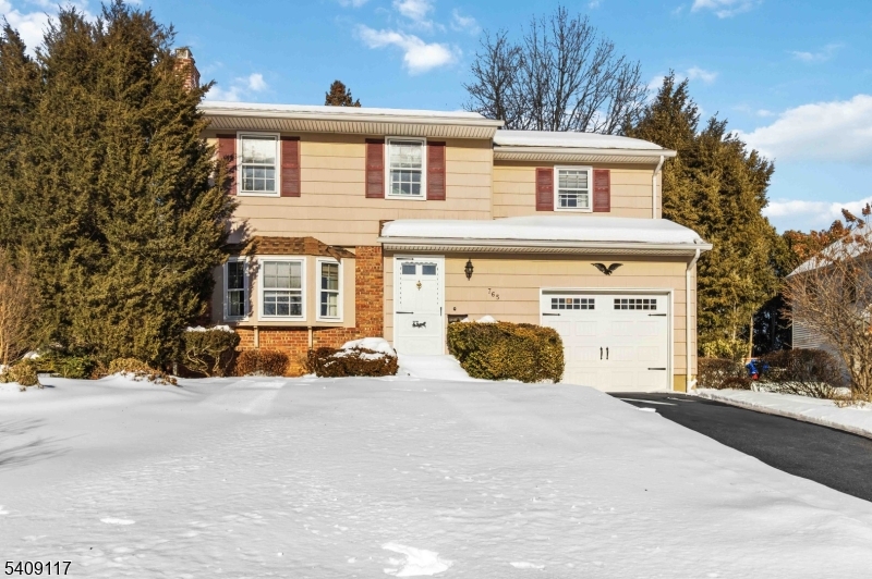Pristine North Side Side Hall Colonial located in a highly sought-after walking neighborhood near the elementary school and close to downtown. This lovingly maintained home features a wood-burning fireplace, spacious family and dining rooms, and gorgeous gleaming hardwood floors throughout. The custom eat-in kitchen offers a pantry and Sub-Zero refrigerator. A large entrance vestibule welcomes you, with a convenient mudroom entry from the garage, first-floor laundry, and powder room. The second level includes three oversized bedrooms (one large enough to be converted into two), a main bath with updated vanity, and an oversized primary bedroom with walk-in closet and en-suite bath featuring a stall shower and bidet. The fabulous lower-level rec room includes a wet bar and office area perfect for entertaining or working from home. Additional highlights include an oversized one-car garage and a level backyard with patio. Estate sale with no known defects; owners took great pride in their home. Being sold strictly AS IS; inspections for informational purposes only.