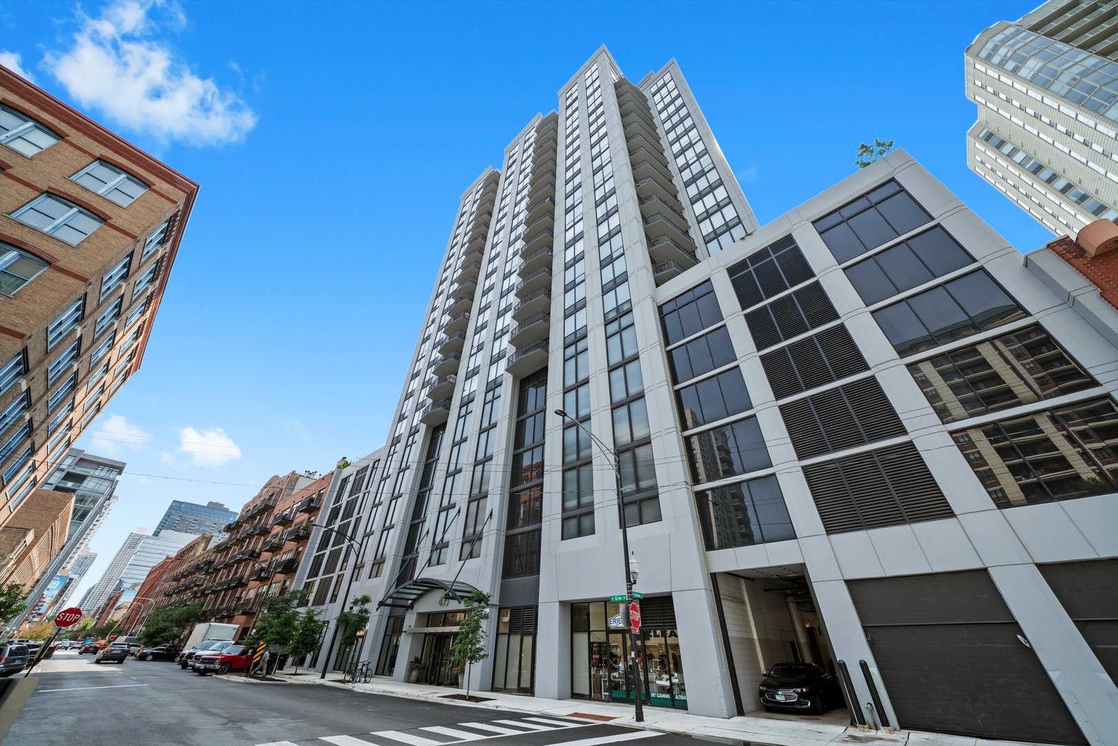 Impeccably updated River North 1-Bed/1-Bath move-in ready condo! Step into an open-concept living area with breathtaking city views and new hardwood floors throughout. The spacious kitchen offers extensive granite countertops, abundant storage including a built-in pantry, and a large breakfast bar-perfect for cooking, dining, and entertaining. The expansive living room showcases dramatic city views and provides plenty of space for both lounging and a dedicated work-from-home setup. Impress your guests from your private balcony with breathtaking city views! The king-sized bedroom is a relaxing retreat with continued views, while the updated bath features a spa-like standalone shower. Additional highlights include two oversized closets, in-unit laundry, and a full-sized storage cage. Deeded garage parking available for $35K. This full-amenity building in the heart of River North offers everything you need-restaurants, shopping, entertainment, and transportation all just steps away. Explore the property in 3D! Click the 3D button to take a virtual tour and walk through every detail. Welcome home!