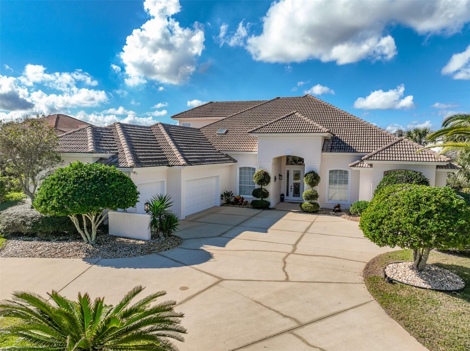 Welcome to Island Estates in Hammock Dunes. Pull you boat up to your DOCK on the Intracoastal and step into this Machin POOL home (one of Palm Coast’s premier builders) with many updates. The current owner has made the following IMPROVEMENTS creating an open concept perfect for entertaining family and friends.  COMPLETE REMODEL OF KITCHEN-Removed wall, reconfigured kitchen, cabinets, appliances, wine cooler; NEW CARPET FIRST FLOOR BEDROOMS AND OFFICE; PRIMARY BATH–New cabinets, light fixtures, glass shower enclosure; POOL RESURFACE; POOL ENCLOSURE PAINTED AND SCREEN REPLACED; POOL DECK PAINTED; POOL PUMP AND HEATER; OUTDOOR KITCHEN; BOAT DOCK REFURBISHED AND LIFT UPDATED, WATER AND ELECTRIC ADDED; PAINTED INTERIOR AND EXTERIOR; NEW WASHER AND DRYER; REPLACED FANS AND LIGHT FIXTURES; REPLACED UPSTAIRS HVAC; NEW WATER HEATER WITH RE-CIRCULATOR; 3 BEDROOMS, OFFICE, 3 BATHS ON MAIN LEVEL; SECOND LEVEL HAS BEDROOM, BATH, KITCHENETTE AND FAMILY ROOM WITH LARGE SUN DECK WITH VIEWS OF ICW. This waterfront home is in the gated community of Island Estates which consists of 168 homes on large 1+ acre lots and has private gated beach access.  It is in the area locals refer to as “The Hammock” and is part of Hammock Dunes. Hammock Dunes Club has memberships available but are not required.  In addition to boating, with a membership to Hammock Dunes Club, one can enjoy amenities found in 5-star resorts. Located on the ocean, the club has 2 golf courses, restaurants, pool and splash pad, tennis, croquet, pickle ball, huge fitness center and social events that will appeal to everyone. Palm Coast is the best kept secret in Florida. Miles of beautiful beaches, over 125 miles of bike paths, beautiful parks along Intracoastal Waterway, a thriving art & theater community, home of famous artists, golf courses for every day, fishing, boating, wind sailing, surfing, canoeing are just a few of the things to do. Orlando and Disney World are close for a day outing and Jacksonville with all the shopping one could desire & the famous Mayo Clinic is one hour. NASCAR & ST. Augustine are within a thirty-minute drive.