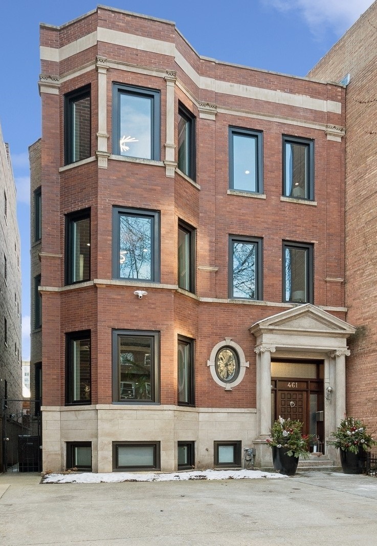 Behind a classic Chicago facade, this contemporary four-level home in East Lakeview offers spacious living and thoughtful updates throughout. Renovated in 2020, this home includes all new mechanicals, windows, designer lighting, and an elevator that connects every level, from the finished basement to the 3rd level.    The main level features a large living and dining area that flows into an open family room and a newer chef's kitchen (2020) with custom cabinetry, premium appliances, a professional-grade hood, a pantry, and a striking marble island. Ceiling heights in the kitchen reach nearly 20 feet, adding to the sense of space. With six spacious above-grade bedrooms, this home offers tremendous flexibility to accommodate a variety of needs-whether you're looking for extra space for guests, multiple home offices, a yoga room, hobby space, or simply room to grow. The primary suite includes a walk-in closet, access to a private deck, and a luxurious full bath. The finished lower level has high ceilings and flexible space for a rec room, gym, or home theater. Other features include zoned HVAC and custom closets.    Outside, enjoy an oversized, fully fenced backyard -- an uncommon find in the city -- ideal for entertaining, gardening, or play. Multiple decks provide additional outdoor living options. There is also parking for up to four cars. Located just half a block from Lake Shore Drive and Belmont Harbor, this home benefits from RM6 zoning, offering strong future development potential in one of Chicago's most desirable neighborhoods. Enjoy easy access to public transportation, including express buses to downtown, the lakefront path, Belmont Harbor, and vibrant shopping and dining along Broadway.
