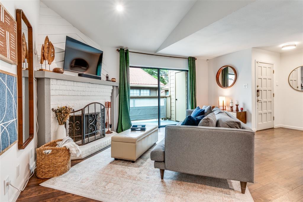 Beautifully maintained, top floor corner unit condo with private walk-up, thoughtful updates and smart-home features throughout. The light and bright living area features wood-laminate flooring that flows seamlessly into the updated kitchen with quartz countertops, stainless steel appliances, and added built-in storage. All windows and screens were replaced in 2022, along with the sliding balcony door, and the unit includes a private balcony with storage. Smart doorbell, lock, lighting, smoke detectors, thermostat, and security system offer modern convenience. Additional improvements include fresh interior caulk and paint (2025), added cabinetry in the laundry area, and a replaced upstairs toilet. The HOA has also completed major updates:sprinkler system, pool replastering, plumbing, painting, and landscaping, making this home move-in ready and worry-free. Prime location near SMU, Highland Park, Hwy 75 Central, and Downtown. Glencoe Park sits just across the street, and the Katy Trail is less than a five-minute walk away.