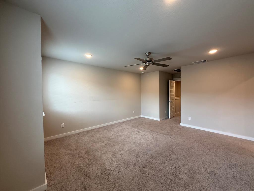 This beautifully constructed 1,783 square foot, two-story home in Fort Worth's Mockingbird Addition neighborhood offers 3 bedrooms and 2.5 bathrooms with a thoughtfully designed floor plan built in 2024. The kitchen is equipped with modern appliances including a refrigerator, stove, oven, microwave, and dishwasher, complemented by a pantry for added storage convenience. The open living and dining room layout creates a welcoming atmosphere, enhanced by wood and carpet flooring throughout, and ceiling fans to keep things comfortable year-round. Upstairs, the primary suite provides a private retreat with an ensuite bathroom, while two additional bedrooms share a well-appointed guest bath. A dedicated laundry room adds everyday practicality to this well-planned layout. Window blinds are included throughout the home for immediate move-in comfort. The attached 2-car garage provides secure parking and additional storage space. Outside, HOA-managed landscaping keeps the exterior looking pristine without the added maintenance burden. This newer construction home is ideally situated in Fort Worth within Tarrant County, offering convenient access to the greater Dallas-Fort Worth metroplex, local shopping, dining, and major commuter routes.