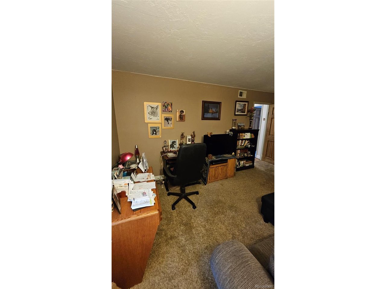 Tucked into the quiet Snowbird Condominiums community, this thoughtfully updated second-floor residence offers comfortable, low-maintenance living in a convenient Lakewood setting. Recent improvements include newer appliances, fresh interior paint, and smooth ceilings throughout following the removal of popcorn texture, leaving a clean, modern canvas ready for immediate enjoyment. A bright and welcoming living area anchors the floor plan, flowing naturally into the dining space and kitchen. Two well-proportioned bedrooms and a full bath complete the layout, offering flexibility for guests, a home office, or a comfortable roommate arrangement. The upper-level position provides added privacy and natural light. Ideally situated near Belmar's shopping and dining, Lakewood's extensive parks and trail system, with quick access to 6th Avenue and downtown Denver, this residence delivers both everyday convenience and long-term value. An excellent opportunity for first-time buyers, those seeking to simplify, or investors looking to add to a portfolio.