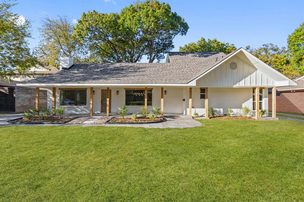 This stunning oversized lot, fully renovated home has undergone a complete transformation, with nearly every feature rebuilt, redesigned, and refined with premium materials. All electrical, plumbing, mechanical, building, and energy code permits were fully approved and inspected by the City of Dallas. Major upgrades include removal of all cast-iron plumbing and installation of new PVC sewer lines, a brand-new HVAC system with warranty, a three-year-old roof, upgraded electrical wiring, and all-new energy-efficient windows, including oversized picture windows. The crawl space features a new vapor barrier, and all floor joists were replaced per engineer specifications along with a new subfloor—providing buyers peace of mind that all major systems and structure have been professionally rebuilt. Inside, the home showcases wide-plank European white oak hardwood floors, all-new premium cabinetry, and a custom floor-to-ceiling fireplace. The designer kitchen offers soft quartzite natural stone countertops and island, Bosch dishwasher and microwave, and a 48-inch JennAir gas range with a custom marble backsplash and hood. The dining room features a glass-enclosed wine display, dry bar, and built-ins—perfect for entertaining. A modern staircase with custom handrail enhances the open feel. The home has been retextured, with half featuring brand-new sheetrock. Bathrooms are fully renovated with designer tile, new vanities, and premium fixtures. The primary suite includes a custom closet and office nook. Exterior highlights include all-new premium Hardie siding for low-maintenance durability, a custom-stained deck, new 8-foot privacy fence, cedar plank posts and header, concrete overlay driveway and porch, designer landscaping, and fresh St. Augustine sod—creating a move-in-ready Dallas home that blends timeless design, craftsmanship, and peace of mind.