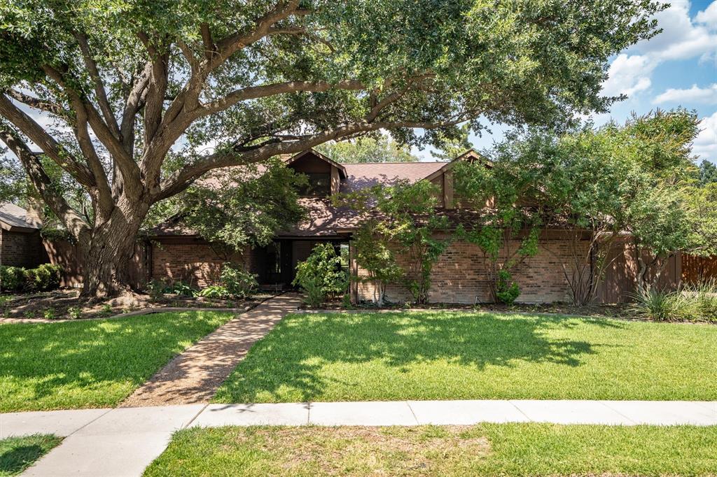 Rarely does an opportunity like this come along. Nestled on a deeded lake lot along one of the few homes on this quiet street with direct water frontage, this beautifully renovated single-story home offers an unexpected oasis in the heart of Plano. Enjoy peaceful lake views, abundant wildlife, and a tranquil setting that feels worlds away while remaining close to everything the city has to offer.Inside, the home has been thoughtfully reimagined with a bright, open layout designed for both everyday living and effortless entertaining. A soaring vaulted great room welcomes you with an abundance of natural light, creating an inviting atmosphere that flows seamlessly throughout the home. At its heart is a spectacular, brand-new chef's kitchen featuring a stunning quartzite island, crisp white cabinetry, gas cooking, three ovens, and a wall of windows that frames the sparkling water beyond. Whether preparing meals or gathering with family and friends, this space is as functional as it is beautiful.Rare for the neighborhood, this spacious home offers five generously sized bedrooms, three full bathrooms, and a versatile sunroom overlooking the lake—perfect as a second living area, home office, playroom, or peaceful retreat. The seamless connection between the indoor living spaces and the picturesque waterfront creates a lifestyle that is both relaxing and refined.With its exceptional deeded lake lot, thoughtfully designed renovations, rare five-bedroom floor plan, and timeless single-story layout, this is a truly special property that offers the perfect blend of luxury, comfort, and serenity.