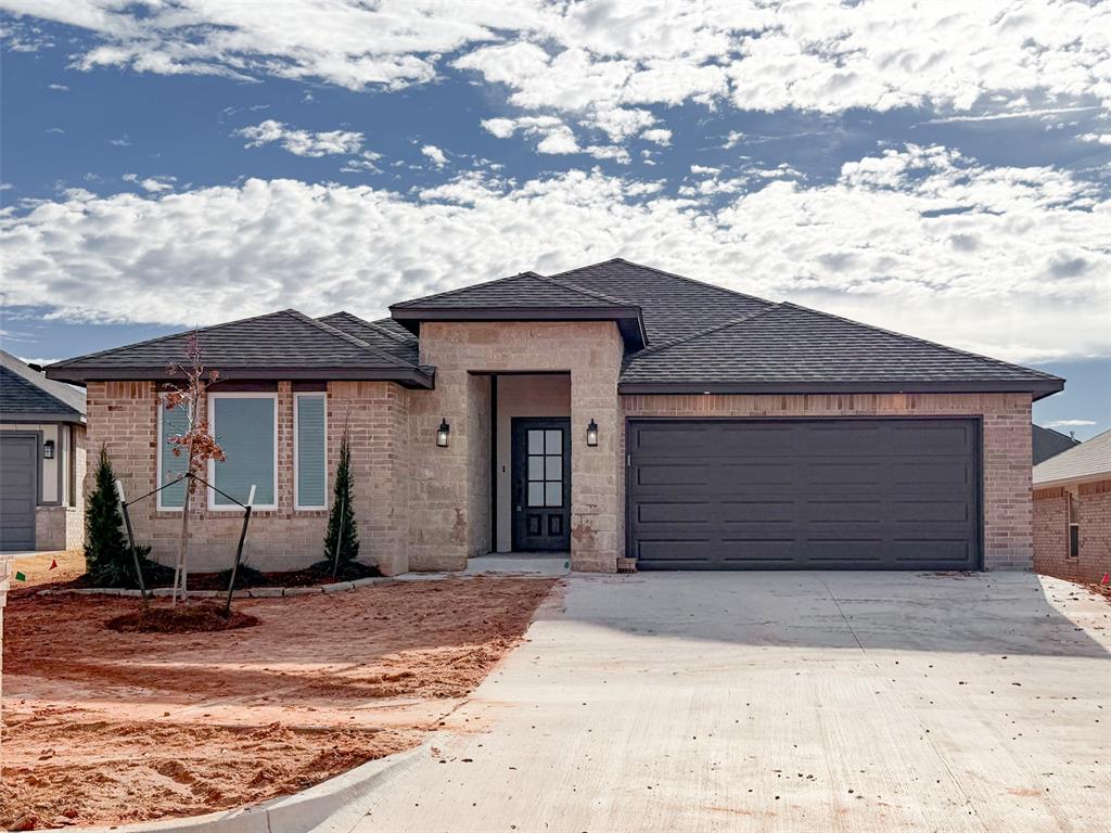 Stunning New Construction with Designer Touches and Smart Layout! Discover the perfect blend of luxury and functionality in this beautifully designed, Modern Sunray floor plan. This nearly move-in ready home features an open layout enhanced by durable wood-look tile flooring throughout all main living areas, ideal for both everyday living and entertaining. The spacious covered patio extends your living space outdoors, perfect for relaxing evenings or weekend gatherings. At the heart of the home is a gourmet kitchen that’s sure to impress, showcasing custom-built maple cabinetry, stainless steel appliances, quartz countertops, a designer vent hood over a gas range, and a massive island, offering unmatched prep space in homes of this size. Pendant lighting adds a touch of elegance, while a walk-in pantry keeps everything organized. Retreat to the private primary suite, which features a generous bedroom, a walk-in closet with direct access to the laundry/mudroom, and a spa-inspired en-suite bath complete with a garden soaking tub and a frameless glass walk-in shower, a true luxury experience. Two spacious secondary bedrooms offer large closets and share a beautifully appointed hall bath with a fully tiled tub surround. This home comes complete with 2" blinds, a tankless water heater, and a sprinkler system! With energy-efficient features, modern finishes, and a functional layout, this home checks every box for today’s savvy homebuyer.