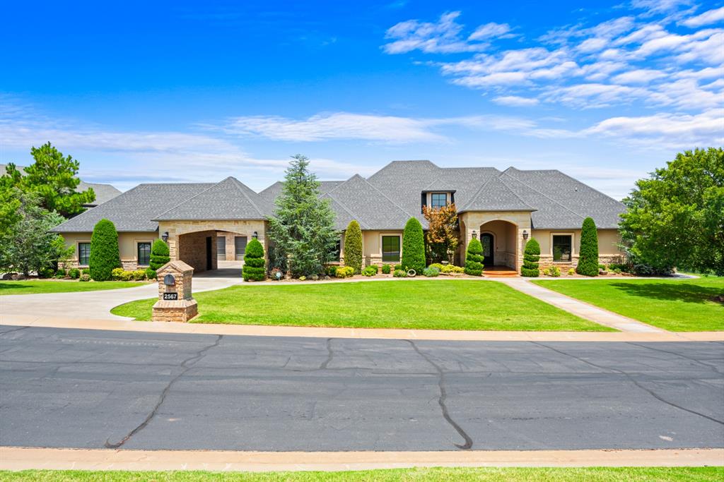 Luxury living with breathtaking views in Summit Lake Estates! Perfectly positioned on a beautiful .76-acre lot, this exceptional home offers an ideal blend of elegance, comfort, and functionality. Designed primarily as a single-level home, the thoughtfully planned layout features all main living spaces on the first floor, with only a full bath and an optional fifth bedroom or bonus room upstairs. Inside, you’ll find expansive living and entertaining spaces filled with natural light, quality finishes, and timeless design. The spacious kitchen opens seamlessly to the main living areas, creating the perfect setting for everyday living and hosting family and friends.One of the home’s standout features is the incredible enclosed patio, complete with walls of windows, heating and air conditioning, allowing you to enjoy the stunning water views comfortably in every season. Car enthusiasts and hobbyists will appreciate the oversized six-car garage, including a dedicated two-car garage equipped with its own mini-split system, providing year-round climate control. Additional premium features include a Generac generator for peace of mind and a safe room for added security. Offering an unbeatable combination of luxury, practicality, and exceptional amenities in one of Deer Creeks most desirable neighborhoods, this remarkable property is a rare opportunity to enjoy refined living with spectacular views.