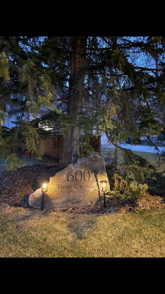 Life unfolds differently when the river is your backyard and this exceptional Bowness residence captures that rare connection with sweeping Bow River views from nearly every room. Thoughtfully designed to embrace it's setting, the home sits on an extraordinary 200’ deep lot backing directly onto the water, creating a sense of privacy, scale and natural beauty that is increasingly hard to find in the city. An open main floor layout anchored by solid natural hardwood floors and custom wood shutters allows light and views to flow effortlessly throughout the space, while central air conditioning and central vacuum enhance everyday comfod convenience. A dedicated den enclosed by French doors offers an ideal work-from-home environment, complete with built-ins and a gas fireplace that creates a warm, focused atmosphere. Vaulted ceilings elevate the living room, where oversized windows frame the river beyond and a fireplace with built-in media centre invites quiet evenings and relaxed gatherings. Culinary creativity comes naturally in the striking kitchen, where stone countertops, a gas range, stainless steel appliances and an expansive centre island encourage both casual connection and confident entertaining. The dining area is elevated by chic lighting and a built-in wine rack, setting the stage for memorable meals and celebrations. Outdoor living extends seamlessly onto the massive 2-tiered wood deck, equipped with a gas line for effortless barbecuing, privacy screens and a retractable awning that balances sun and shade throughout the day. A privately tucked powder room completes the main level with thoughtful discretion. Upstairs, a dual primary layout places bedrooms on opposite sides of the home for outstanding privacy, an ideal arrangement for shared living without compromise. The primary retreat enjoys commanding river views and is paired with a luxurious 5-piece ensuite featuring dual sinks, extensive built-ins, a bidet and a generous walk-in closet. Bedroom-level laundry adds daily efficiency, while the second upper bedroom benefits from its own private 4-piece ensuite, offering true independence for guests or family members. The finished basement expands the home’s versatility with a spacious recreation room designed for movie nights and games, a third bedroom with dual closets and a 3-piece bathroom accessible from both the bedroom and common area for flexible use. Outdoor spaces continue to impress with a beautifully landscaped and fully fenced yard (glass panels on the river side)offering remarkable depth, seasonal storage options, a pergola for shaded gatherings and much more! Solar panels are included, supporting energy efficiency and long-term operating savings. Located in one of northwest Calgary’s most established river communities, this setting provides walkable access to Thomas B. Riley, Bowcroft and Bowness High School, while Bowness Park, neighbourhood amenities and a quick commute to downtown ensure everyday life remains connected as well as serene.