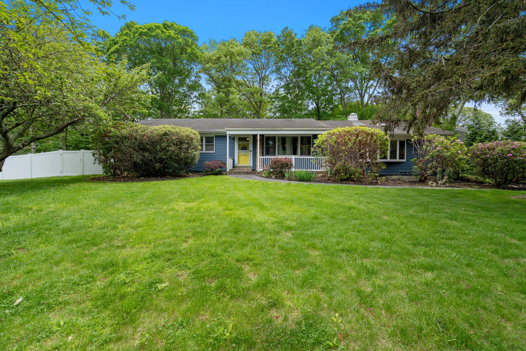 Introducing This Beautiful Home On 2 Canterbury Ct. Located On Long Island’s North Shore. This Charming 2200 Sq. Ft. Sprawling Ranch In The Famed Three Village School District Sits On A Private Maturely Treed Over Half Acre Of Flat Property. The Open Concept Layout With Large Eat In Kitchen Is Perfect For Entertaining Family And Friends. New Anderson 400 Series Windows, New Vinyl Siding, New Furnace, Updated Spray Foam Insulation Make This Home Extremely Energy And Heat Efficient. There Are Three Well Proportioned Bedrooms And 2 1/2 Baths, Gorgeous Hardwood Floors Throughout, Large Living Room And Den With Brick Fireplace, Custom Kitchen Cabinets With Granite Countertops, Custom Crown Molding, Recessed Lighting, Inground Sprinklers And Central Air. Master Bedroom Has En Ensuite Bathroom With A Walk In Shower. Custom Built Cherry Wood Cabinets With All Plywood Construction In Kitchen And Bathroom.  Gas Cooking And Low Taxes. Full Size Unfinished Basement With Unlimited Potential.  Oversized Two Car Garage And Fenced In Yard Accessed By Sliders Off Of The Kitchen. Walk To Port Jefferson Village For Restaurants And Shopping.  This House Will Not Last!