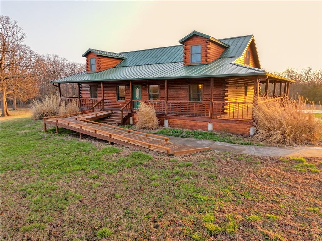Farm For Sale Vernon County MoLocated in Vernon County Mo is a fully equipped for livestock and farm life property ready for production. This working cattle farm offers excellent infrastructure including horse facilities with stalls, corals equipped with heated waterers, and plenty of space for managing livestock year-round. A covered chicken pen adds even more versatility for those wanting to raise poultry or expand their homestead operation.For equipment, vehicles, or hobby space, the property features six garage spaces, providing abundant storage for trucks, ATVs, farm equipment, or workshop areas.The 160± acres surrounding the home provide a beautiful mix of open pasture and wildlife habitat. Two ponds offer water for livestock and wildlife while also adding to the scenic beauty of the property. The land is well suited for grazing cattle, riding horses, or simply enjoying the privacy and space that country living provides.Hunting Property for Sale, Vernon County MissouriOutdoor enthusiasts will especially appreciate the excellent hunting opportunities for whitetail deer and wild turkey. With the combination of timber, open ground, and water sources, the property naturally attracts wildlife and offers great hunting right out your back door. Whether you are looking for a working cattle operation, horse property, hunting retreat, or spacious country home, this remarkable 160± acre farm offers the rare opportunity to own a beautiful log home paired with productive land and outstanding recreational potential. Home for sale El Dorado Springs MoLocated approx. 10 min from El Dorado Springs MO. Escape to the perfect blend of rustic beauty, working farmland, and outdoor recreation with this incredible 160± acre property featuring a stunning log home built in 1998. Offering 5,726 sq ft under roof with approximately 5,026 sq ft of finished living space, this one-of-a-kind home showcases the warmth and character only a true log home can provide.
