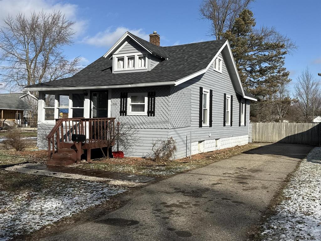 Welcome to 1920 Schoolcraft, a charming Craftsman-style home with character and extensive updates that is perfect for a first-time buyer or retiree looking to downsize. Recent improvements include a new roof, freshly painted cedar siding, updated walkway, and a welcoming front deck. Inside, enjoy a bright 3-season porch, newer laminate floors, updated lighting, modern blinds, and coordinated hardware throughout. The kitchen features refreshed cabinetry, included appliances, and updated fixtures, while the bathroom offers quality finishes and thoughtful upgrades. Updated plumbing, a dry basement, and meticulous care throughout make this truly move-in ready