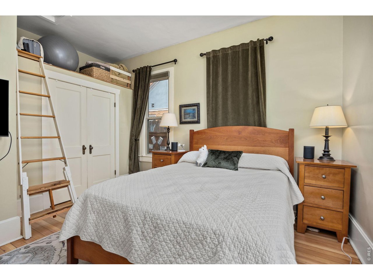 A TIMELESS 1905 TREASURE, THOUGHTFULLY REIMAGINED FOR MODERN LIVING! Built in 1905, this classic downtown Loveland residence has enjoyed a rich and storied life on vibrant 7th Street. In 2021, a tastefully designed full second story addition-paired with extensive main level updates-beautifully transformed the home for today's lifestyle. Every detail of this meticulous renovation was guided by a deep respect for the home's history, preserving its original character while seamlessly integrating contemporary comforts. The result is a rare and inspiring blend of historic charm and modern living-a true tribute to the craftsmanship, culture, and elegance of a bygone era. The main level offers exceptional functionality, featuring a primary bedroom, expansive kitchen, large full bathroom, dedicated office space, laundry room, and an open concept living and dining area. The kitchen is a cook's delight, showcasing upper end appliances, a built in desk, and generous cabinetry with striking 42 inch upper cabinets. Upstairs, two spacious bedrooms with impressive closets share Jack and Jill access to a stunning five piece bathroom, creating a private and well designed retreat. The exterior evokes the feeling of a true sanctuary. Enjoy two separate patio spaces, meandering pathways, and planters equipped with drip irrigation supporting an incredible array of flowers, herbs, fruits, and plants. A functional detached shed offers flexibility as an office or hobby space, while the oversized two car garage with alley access adds convenience. The entire property is enclosed by a wood privacy fence, providing a sense of seclusion rarely found in Old Town. Every inch of this home exudes quality and style. Offering state of the art living, a deep respect for history, and exceptional privacy-all within the treasured Old Town Loveland-this is a home that perfectly answers the call to live the Rocky Mountain lifestyle of your dreams.