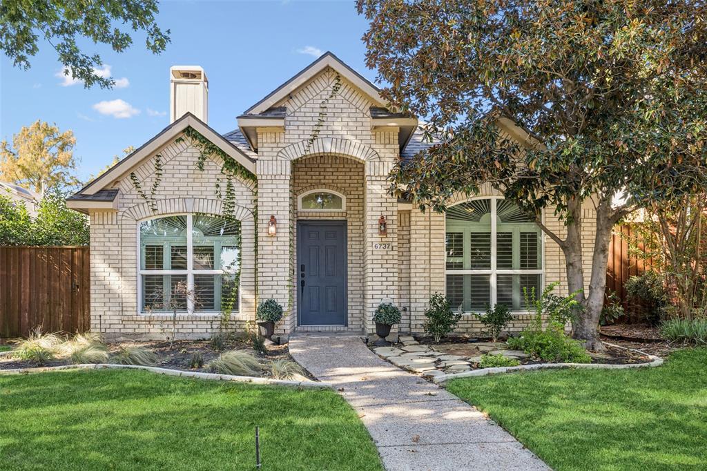 Meticulously maintained and truly move-in ready, this charming home shines with pride of ownership and thoughtful updates.  Located in the sought-after Plano ISD, this home offers an inviting open-concept floorplan filled with natural light and a warm, welcoming atmosphere. The spacious primary suite is a true retreat, featuring gorgeous windows, a cozy fireplace, and a spa-like bath with dual sinks, a jetted garden tub, separate shower, and a generous walk-in closet. The chef’s kitchen impresses with crisp white cabinetry, ample counter and storage space, and a bright dining area perfect for morning coffee or casual meals. Step outside to enjoy the private fenced backyard, complete with a charming stone patio—ideal for relaxing or entertaining. 95 foot back driveway and added parking pad has enough room for RV-trailer AND boat, full window replacement (Pella windows) and plantation shutters (2024), HVAC (2020), Insulation to attic  as well as adding power attic ventilation fans (2024), Re-sod and front landscaping redone with zoysia grass (2023), bonus room-storage in garage (used as office space with hardwired Internet as well as it being air conditioned), exterior Trimlights (permanent holiday lights). Attached two-car garage providing storage, security, and convenience. This home perfectly blends comfort, style, and practicality—schedule your showing today to experience all it has to offer!