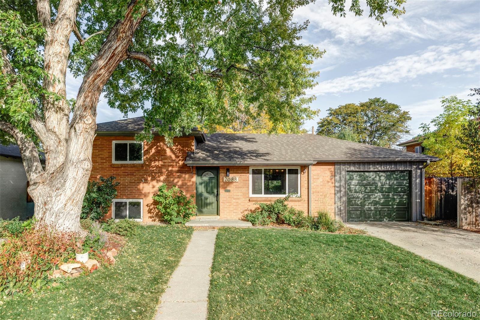 Discover this beautifully remodeled tri-level home featuring 3 bedrooms, 2 bathrooms, and modern upgrades including brand-new stainless steel appliances, an attached garage with direct home access, two spacious living rooms, and a cozy dining nook, all nestled in the desirable Harvey Park neighborhood literally across the street from Harvey Park and Harvey Park Lake, and minutes from Whole Foods, Target, Nordstrom, and movie theaters, offering the perfect blend of contemporary comfort, urban convenience, and outdoor serenity—schedule a showing today!