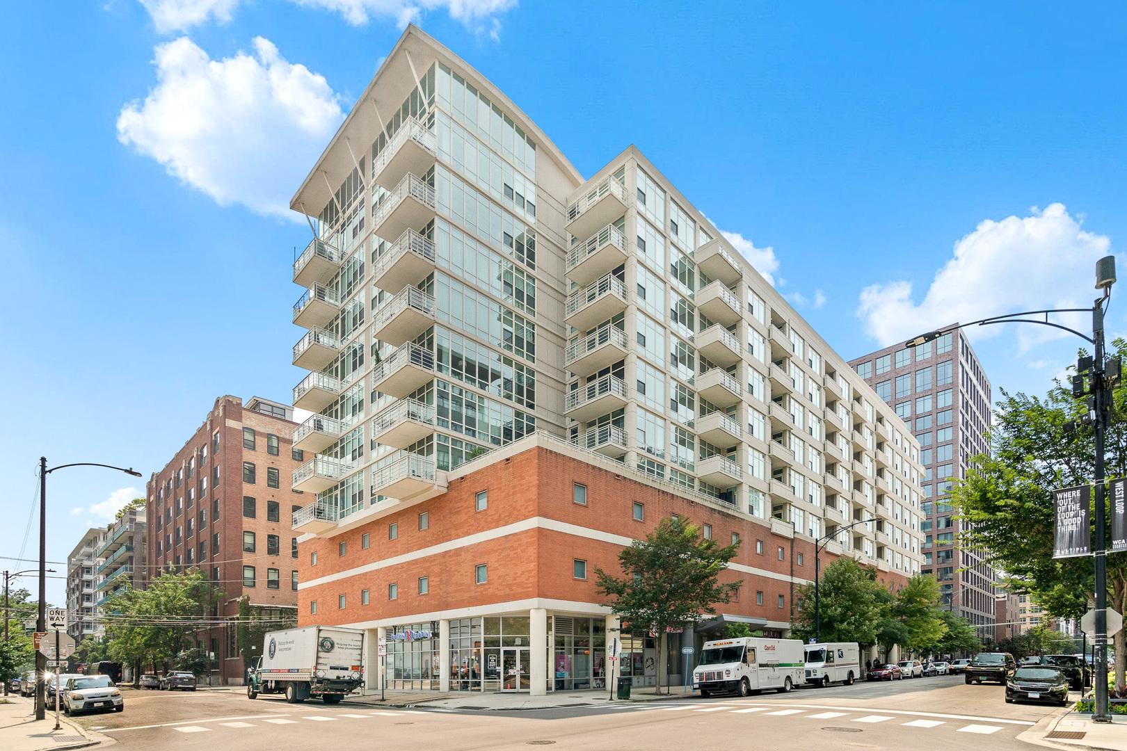Welcome to a beautifully updated and freshly painted residence in one of the West Loop's most coveted boutique buildings. This bright and spacious home features white cabinetry, granite countertops, and stainless steel appliances, offering a clean, modern aesthetic perfect for today's lifestyle. The open-concept layout seamlessly flows into a private balcony, ideal for morning coffee or evening wine. The generously sized bedroom includes brand new carpet, a walk-in closet, providing ample storage and functionality. Enjoy high 9' ceilings, hardwood floors, in-unit laundry, and floor-to-ceiling windows that flood the space with natural light. Prime deeded parking available for an additional $35,000. Additional storage cage included as well. Situated in the heart of the West Loop, you're steps from renowned restaurants, shops, parks, and public transportation. Experience refined urban living at its finest.