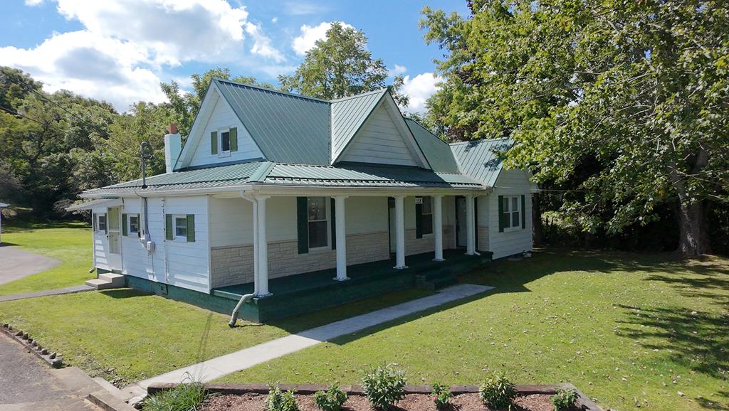 Discover the charm of country living at 158 Slemp Creek Road in beautiful Sugar Grove, VA. This well-maintained 1960 home offers three bedrooms, one bathroom, and a welcoming layout filled with potential. Additionally, a new oil furnace and water heater will ensure that you stay comfortable and worry-free during the cold winter months. While the home itself provides comfort and character, the true highlight of this property is the land—2.06 acres of nearly flat terrain, a rare find in the mountains of Southwest Virginia. Perfect for those seeking space to garden, keep animals, or create a mini-farm, the property includes several outbuildings and a barn, offering endless opportunities for homesteading or hobby farming. Mature trees, open grassy areas, and the peaceful surroundings create a setting that feels private and serene while still being conveniently located. Just a short drive away, you'll find the amenities of Marion, VA, along with countless outdoor adventures. Whether you enjoy hiking the Appalachian Trail, exploring the Jefferson National Forest, paddling at Hungry Mother State Park, or taking in the breathtaking views at Grayson Highlands State Park, this home places you at the gateway to some of Virginia's most stunning recreation areas. With its combination of usable land, a charming home, and a quiet community, this property is an ideal retreat for those looking to enjoy the best of country living without sacrificing convenience.