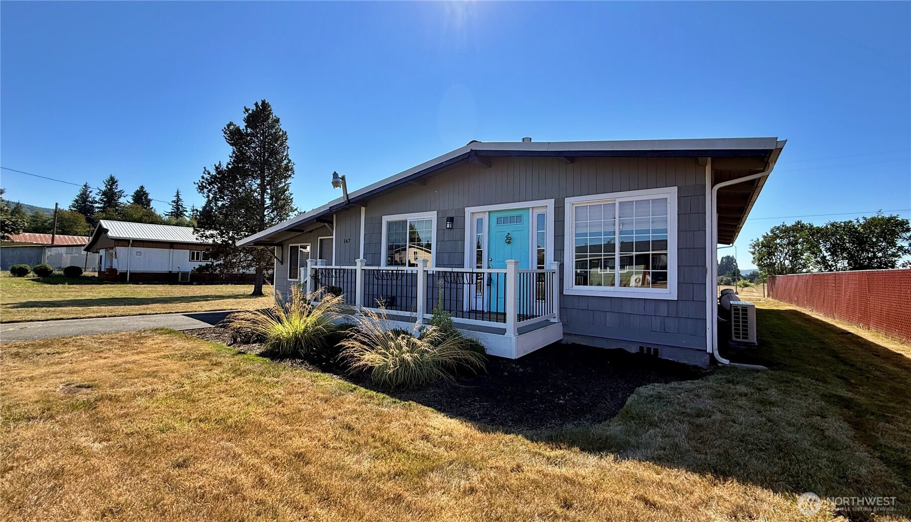 Welcome to this 3 bedroom 1.75 bath that has ALL the CHARM! Relax in or go right out the back yard to the Klickitat Park and beautiful SUNSETS! Large yard (2 parcels) with a newer storage shed has room for gardening or build your own garage. This quiet neighborhood is perfect for walks, bike rides and a quick walk to the store, post office or restaurant. The kitchen is adorable, with a gas range hybrid (electric) oven. Nice walk in pantry and ample storage. Lots of details here that make this one perfect for a starter that has room to grow. New mini splits for easy temp anytime, a propane fireplace for cozy winters. The laundry/mud room has tons of storage, an exterior door and a large jacuzzi soak tub (the owner has never used.) Give a call and check this one out today!
