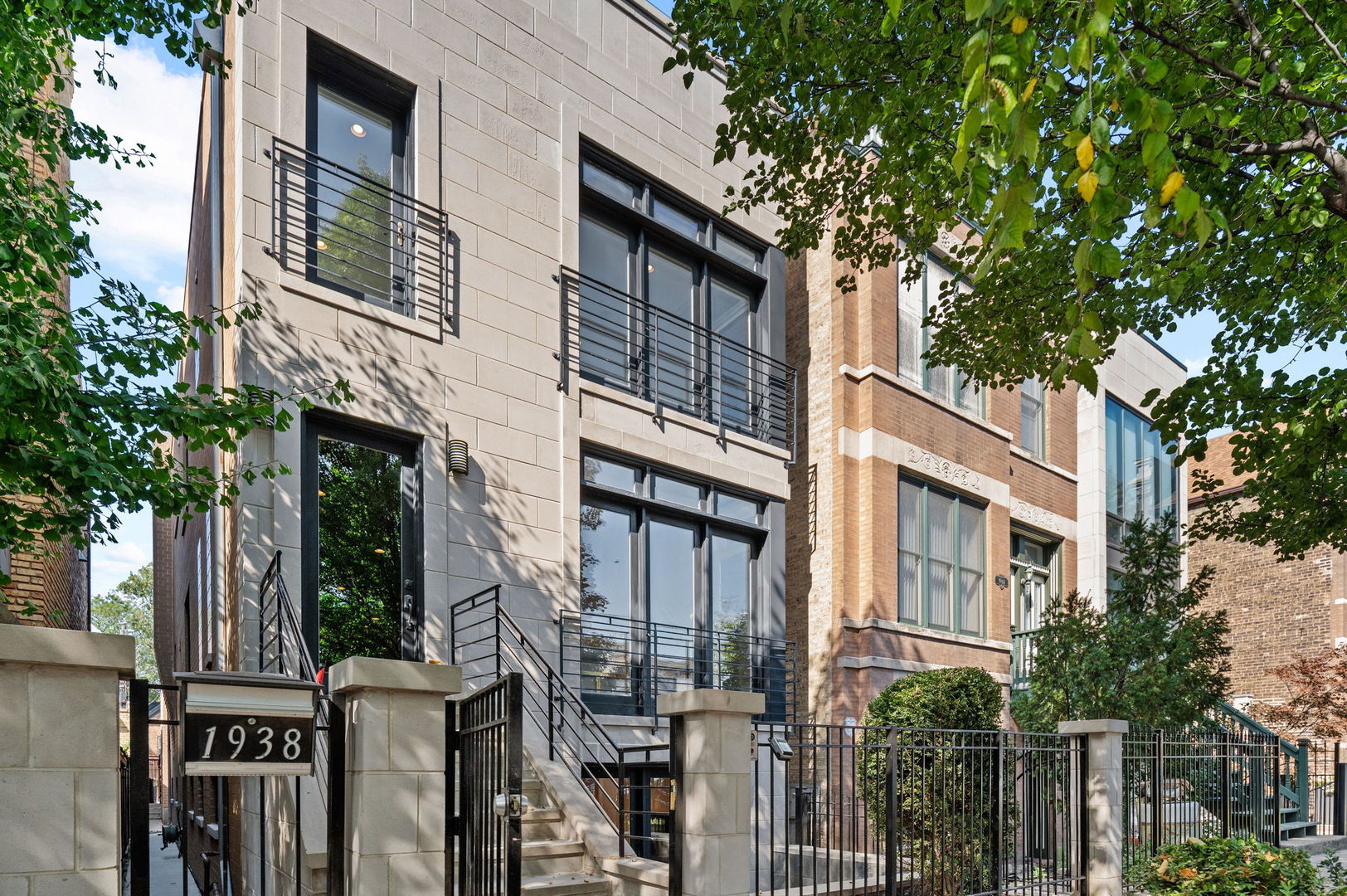 * Check out the video & the 3D tour of this home * Charming & stunning three-story all masonry home nestled in a wonderful block of Bucktown! This home features 4 bedrooms (3 upstairs), 3.5 bathrooms, a finished basement, front and rear patios, a garage rooftop deck, a two-car garage, and the crown jewel: a stunning rooftop deck with a pergola. This residence offers the perfect blend of elegance and modern updates. It features an open, airy, and intelligent floor plan, with large windows that bring in ample natural light from all exposures. The main floor flows beautifully, featuring a large, sunny living room, a dedicated dining room, a private powder room, a stunning kitchen with modern-style cabinetry, professional-grade appliances, stone countertops, a custom herringbone pattern backsplash, and a spacious pantry. A bright family room with a fireplace leads to the garage rooftop and the rear patio, which are an entertainer's dream, perfect for grilling, dining, relaxing, outdoor movie nights, and watching your plants grow. The second floor features three sunny bedrooms and two full bathrooms, with the large primary suite boasting an oversized walk-in closet and an attached bath with designer-grade finishes, including dual vanities, a walk-in shower, and a jacuzzi tub. The top-floor den/office, complete with a wet bar, opens onto the massive rooftop deck, featuring a pergola that creates a true oasis in the city, unlike any other in the neighborhood. The lower level, featuring heated floors, is both cozy and spacious, and includes a family room with a walk-out patio, a fourth bedroom, a full bathroom, a laundry room, and storage space. Several recent updates include: New paint throughout, professionally painted kitchen cabinets and vanities, extensive exterior masonry work, new carpet, new light fixtures, two new Carrier furnaces, and one A/C, Hunter Douglas window treatments, a garage rooftop deck, and a full rooftop deck with pergola (Ask your agent for the detailed list of improvements). This impeccable home is not a flip or investor-owned; the owners have made numerous additional improvements with love and care, making it completely move-in ready. Fall in love with all that Bucktown has to offer - Unbeatable location! Private security, two blocks to the Bloomingdale Trail, and a few minutes' walk to Wicker Park, Holstein Park, Walsh Park, Churchill Field Park, popular restaurants/bars/retail, coffee shops, nightlife, and so much more! Easy access to the Damen Blue Line, Clybourn Metra station, and the highway, and situated in the desirable Pulaski Elementary School District - Welcome home!