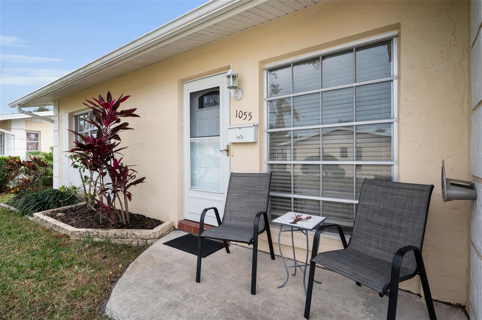 Fantastic Dunedin Location – Perfect for Seasonal or Year-Round Living!Welcome to Heather Hill, a vibrant 55+ condo community offering a truly maintenance-free lifestyle. Located in a non-flood and non-evacuation zone, this property experienced no damage from last year’s storms—giving you added peace of mind.This affordable 2-bedroom, 2-bathroom villa is priced to sell and sits on a desirable end-unit lot with a long driveway for extra parking plus an attached garage. Inside, you’ll find a bright and inviting open floor plan with a spacious living room and a large hallway closet providing exceptional storage.A highlight of the home is the oversized, sun-filled Florida room/screened porch—the perfect spot to enjoy your morning coffee, unwind with a good book, or entertain guests.Heather Hill offers fantastic community amenities, including a heated pool, a paved sun deck, and shuffleboard courts—all just steps from your door.This prime Dunedin location puts you minutes from vibrant downtown Dunedin, major roadways, great shopping, dining, and the world-famous Gulf beaches, including Honeymoon Island. Sports lovers will appreciate being just a few miles from spring training facilities for the Toronto Blue Jays and Philadelphia Phillies.Don’t miss this rare opportunity to experience the best of Florida living—whether you’re a full-time resident or a snowbird seeking a sunny winter retreat!
