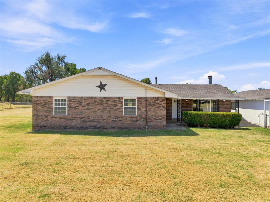 Looking for plenty of space, both inside and out? You found it! Situated on a fully fenced 1.68-acre lot, this true four-bedroom home offers the space, flexibility, and functionality you've been searching for.Bring the furry and feathered friends because this property welcomes them all! With room for chickens, goats, and even horses, plus a small barn ready to provide shelter for livestock, the possibilities are endless. Two separate fenced areas in the backyard offer the perfect setup for keeping animals separate while still leaving plenty of space for outdoor entertaining, play, and everyday enjoyment.Inside, you'll find four true bedrooms, an additional flex space, two dining areas, and plenty of storage throughout. The spacious living room is centered around a beautiful wood-burning fireplace with a curved hearth and built-in bookshelves on either side, creating a warm and inviting focal point. Just off the living room, the versatile flex space would make the perfect playroom, home office, hobby room, or whatever best fits your lifestyle. Near the entry, a large coat and miscellaneous storage area provides even more room to keep things organized.The updates throughout this home are sure to impress! UPDATES INCLUDE: hail-resistant roof shingles (2024), flooring throughout (2024), well casing, pump, and electrical lines (2025), refrigerator that stays with the home (2025), gas dryer that stays with the home (2026), split unit in the flex space (2024), and a fresh gravel drive (2024).Outside, the detached garage offers even more versatility with a connected carport and workshop, giving you plenty of room for vehicles, projects, tools, and storage.With room for everyone, space for your animals, and several valuable updates already completed, this property is ready for its new owners to make it home. Schedule your private tour today!