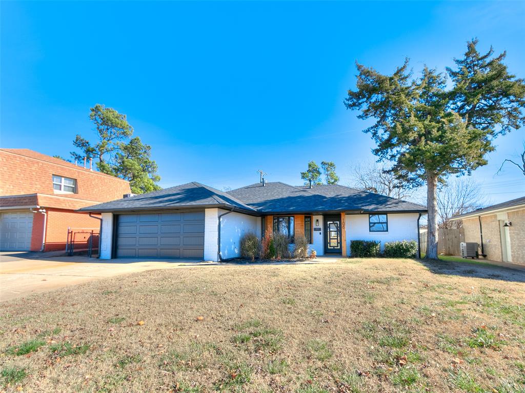 Not many like this complete, studs in remodel available right now! Virtually every surface has been touched, including the all new kitchen and enlarged closets and magnificently appointed bathrooms! The already expansive living area has had the ceiling vaulted, creating the feeling of a much larger space. Exterior has been freshened with paint and cedar accents, along with a brand new roof. Interior provides a custom feel, with new tile and carpet along with plenty of lighting to accent the all new appliances and fixtures. This home evokes the feel of new construction, but in an established neighborhood in the quite desirable Moore Schools! This beautifully renditioned home is ready for you to move in and start making new memories!!!